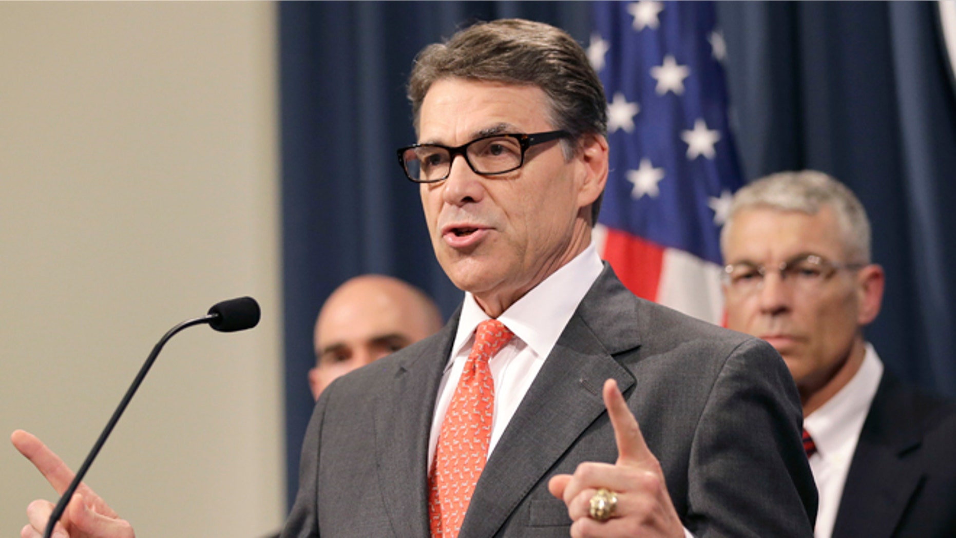 This July 21, 2014, file photo shows Gov. Rick Perry as he speaks during a news conference in the Governor's press room, in Austin, Texas. Texas. (AP Photo/Eric Gay, File)