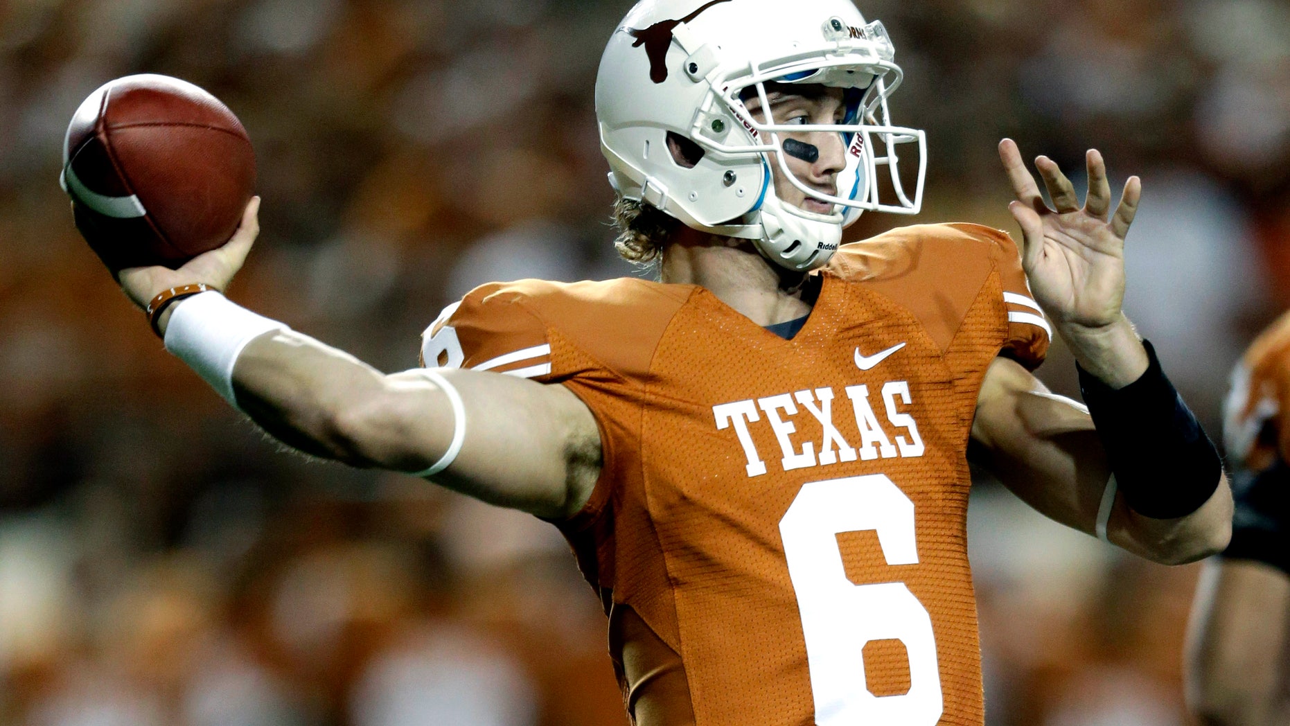 Sept. 8, 2012: In this file photo, Texas' Case McCoy looks to pass against New Mexico during the first quarter of an NCAA college football game in Austin, Texas.
