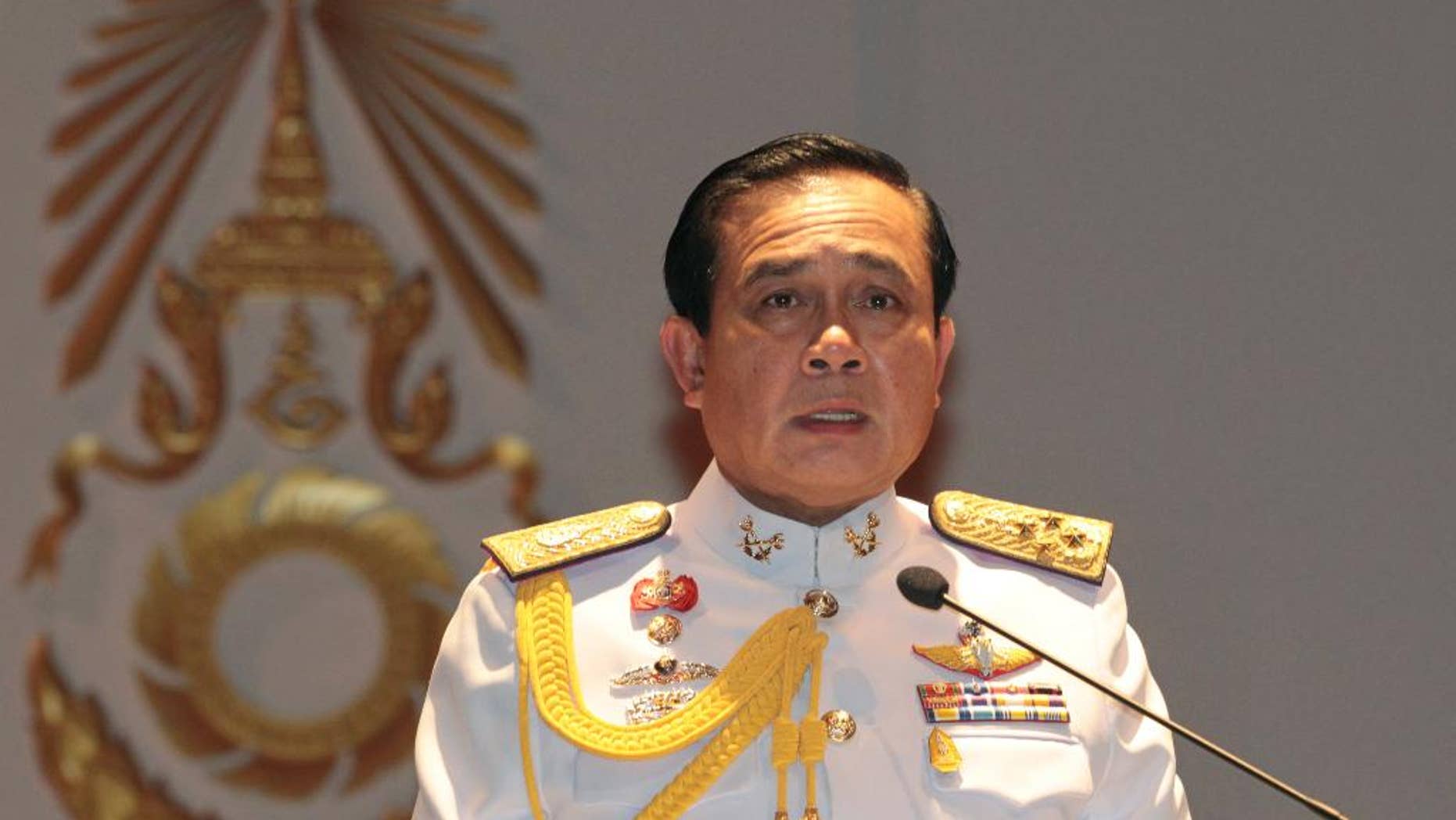 FILE - In this Monday, May 26, 2014 file photo, Gen. Prayuth Chan-ocha speaks at the start of his first press conference since Thursday's coup. Thailand's junta-appointed legislature voted unanimously Thursday to name Prayuth Chan-ocha to the post of of prime minister during a session in Bangkok. (AP Photo/Sakchai Lalit, File)