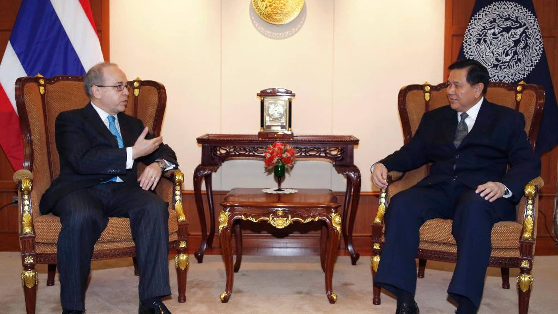 FILE - In this Monday, Jan. 26, 2015, file photo, U.S. Assistant Secretary of State for East Asian and Pacific Affairs Daniel Russel, left, talks to Thai Deputy Prime Minister and Foreign Minister Tanasak Patimapragorn during their meeting at the Foreign Ministry in Bangkok, Thailand. Russel's controversial speech to students at Chulalongkorn University on Monday has laid bare the delicate path Thailand’s leaders have been trying to navigate since toppling a democratically elected government in May, both by keeping a lid on dissent at home and by maintaining good relations with foreign allies abroad. (AP Photo/Sakchai Lalit, File)