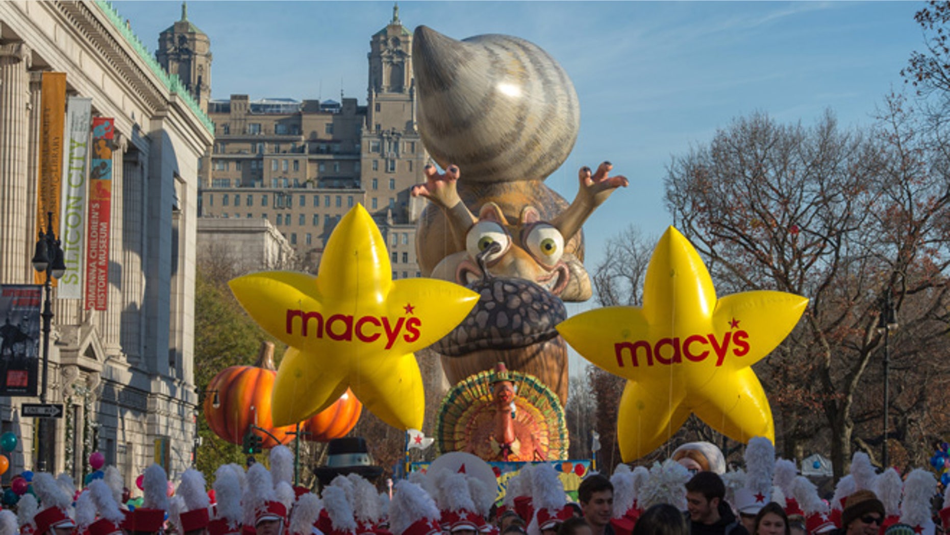 Performers stand in front of balloons at the start of the Macy's Thanksgiving Day Parade, Thursday Nov. 26, 2015, in New York. (AP Photo/Bryan R. Smith)