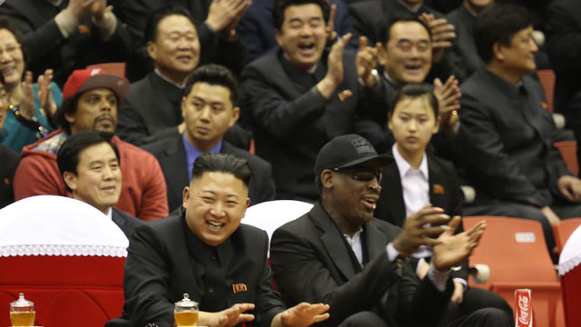 FILE - North Korean leader Kim Jong Un, left, and former NBA star Dennis Rodman watch North Korean and U.S. players in an exhibition basketball game at an arena in Pyongyang, North Korea, Thursday, Feb. 28, 2013. (AP Photo)