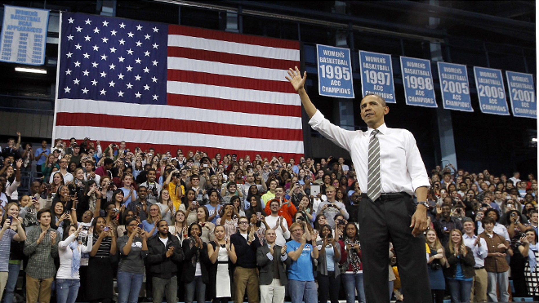 FILE - In this April 24, 2012, file photo President Barack Obama acknowledges the crowd after speaking at the University of North Carolina in Chapel Hill, N.C. Demographic changes and recent election results reveal a more nuanced landscape in southern states now as the two major parties prepare for their national conventions. Republicans convene Aug. 27 in Florida, a melting-pot battleground state, to nominate Mitt Romney of Massachusetts. Democrats will toast Barack Obama the following week in North Carolina, the perfect example of a Southern electorate not so easily pigeon-holed. (AP Photo/The News & Observer, Chuck Liddy, Pool)