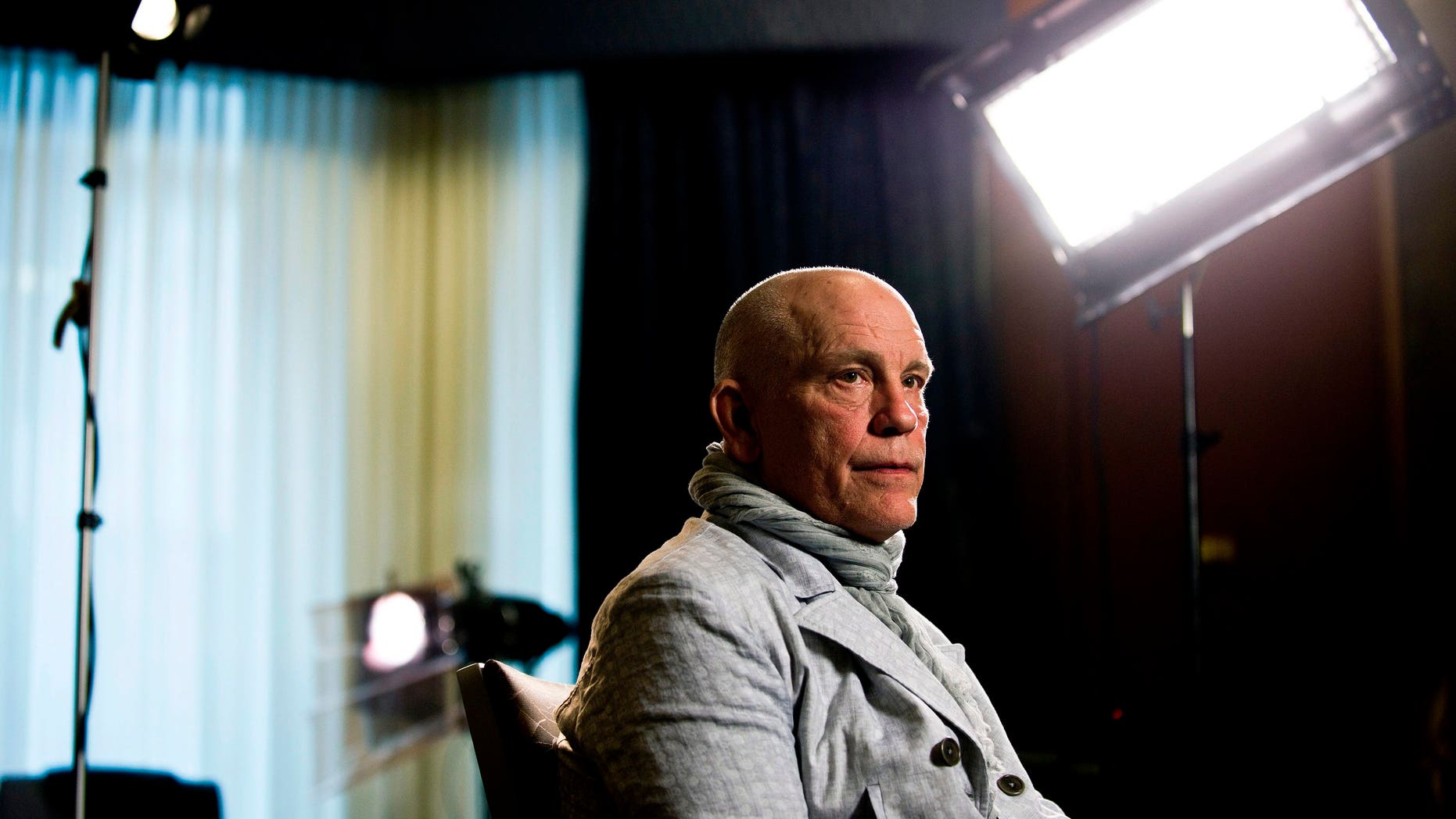 Actor John Malkovich speaks with media at the King Edward Hotel in Toronto to promote his new role as Casanova in The Giacomo Variations, on Thursday, June 6, 2013. The show runs June 7-9. (AP Photo/The Canadian Press, Galit Rodan)