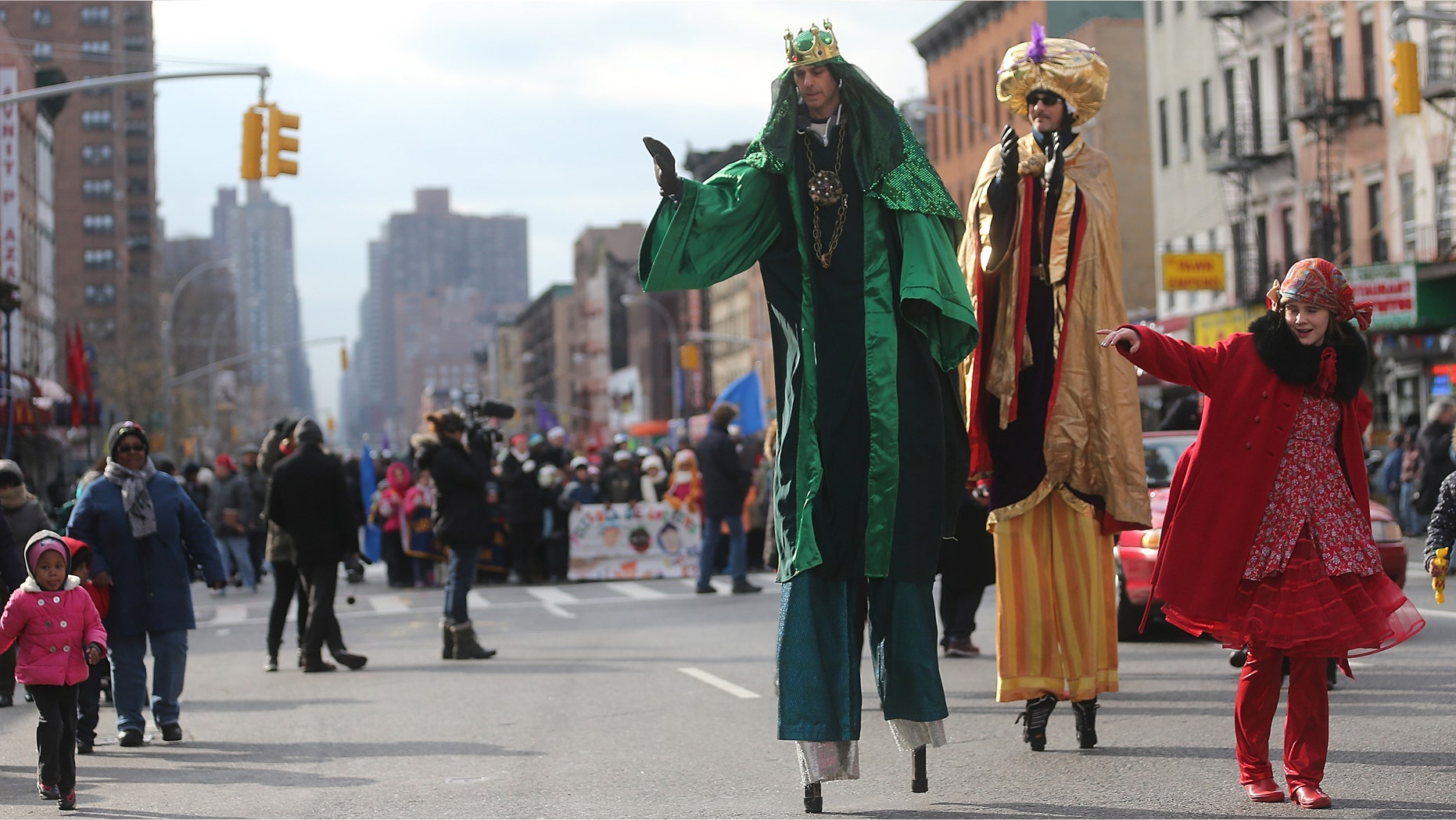 Revelers march during the Three Kings Day Parade in East Harlem on January 4, 2013 in New York City.
