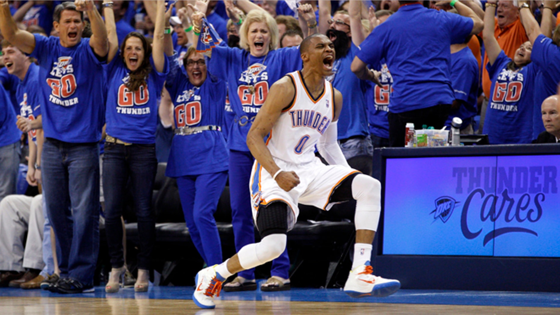 Oklahoma City Thunder guard Russell Westbrook (0) reacts after hitting a basket against the Los Angeles Lakers in the third quarter of Game 5 in their NBA basketball Western Conference semifinal playoff series, Monday, May 21, 2012, in Oklahoma City. (AP Photo/Sue Ogrocki)