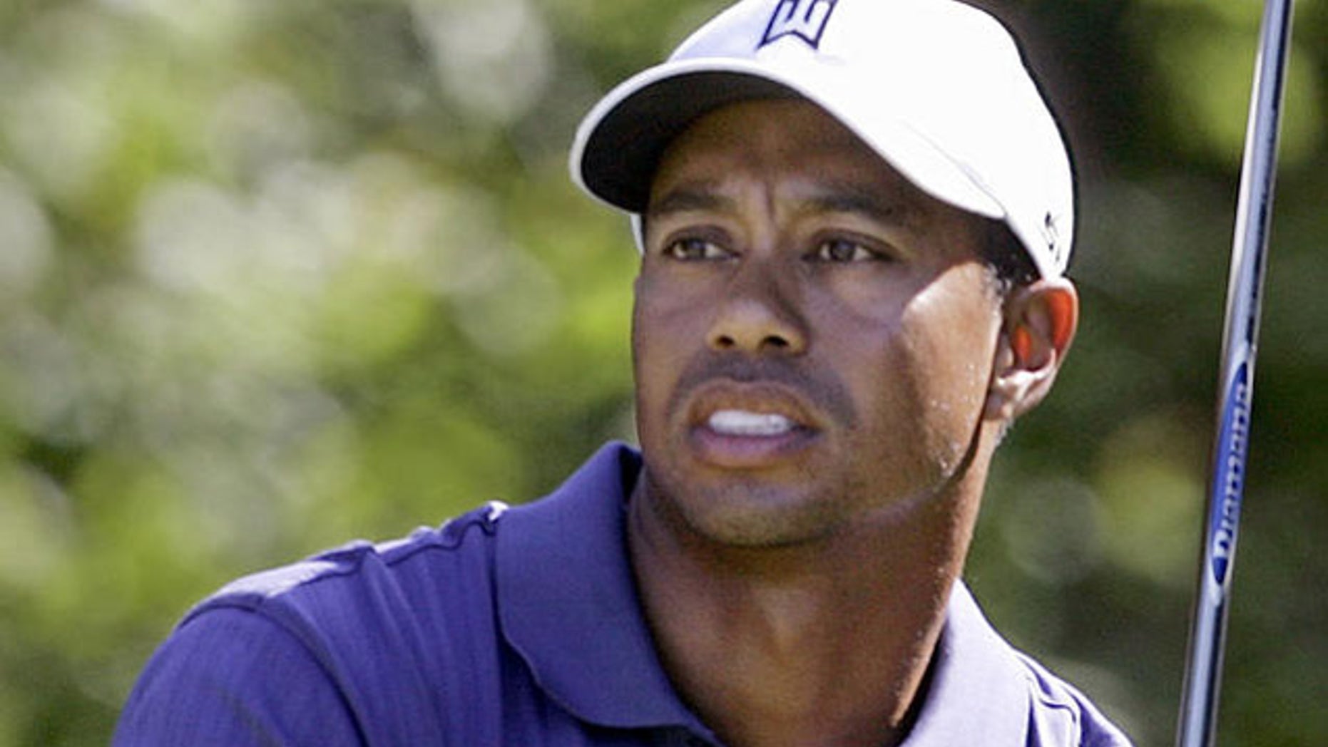 Tiger Woods is now ranked No. 3 in the world. Here, he watches his tee shot sail down the fairway on the back nine during the third round of the Deutsche Bank Championship golf tournament in Norton, Mass., Sunday, Sept. 2, 2007. Woods finished 10 under par heading into Monday's final round. (AP Photo/Stephan Savoia)