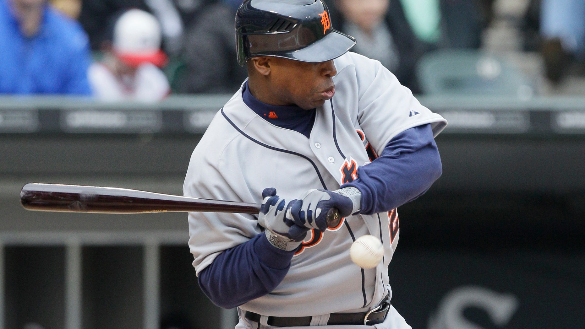 April 14, 2012: Detroit Tigers' Delmon Young is hit by a pitch from Chicago White Sox starter Gavin Floyd during the second inning of an baseball game in Chicago. (AP)