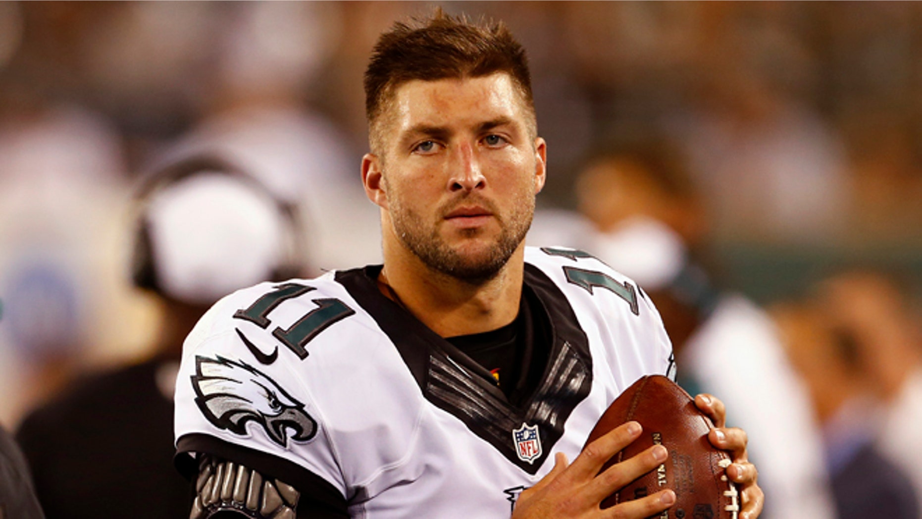 Quarterback Tim Tebow #11 of the Philadelphia Eagles warms up on the sidelines against the New York Jets in the third quarter during a pre-season game at MetLife Stadium on September 3, 2015 in East Rutherford, New Jersey. (Photo by Rich Schultz /Getty Images)