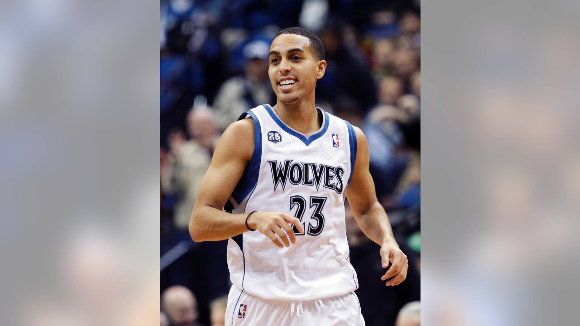 FILE - In this Friday, Nov. 22, 2013 file photo, Minnesota Timberwolves' Kevin Martin smiles after a basket in the second half of an NBA basketball game against the Brooklyn Nets in Minneapolis. Kevin Martin said he cut corners during practice in his first season with the Minnesota Timberwolves last year. Martin is making a more concerted effort to be a leader on this young team, Wednesday, Oct. 1, 2014. (AP Photo/Jim Mone, File)