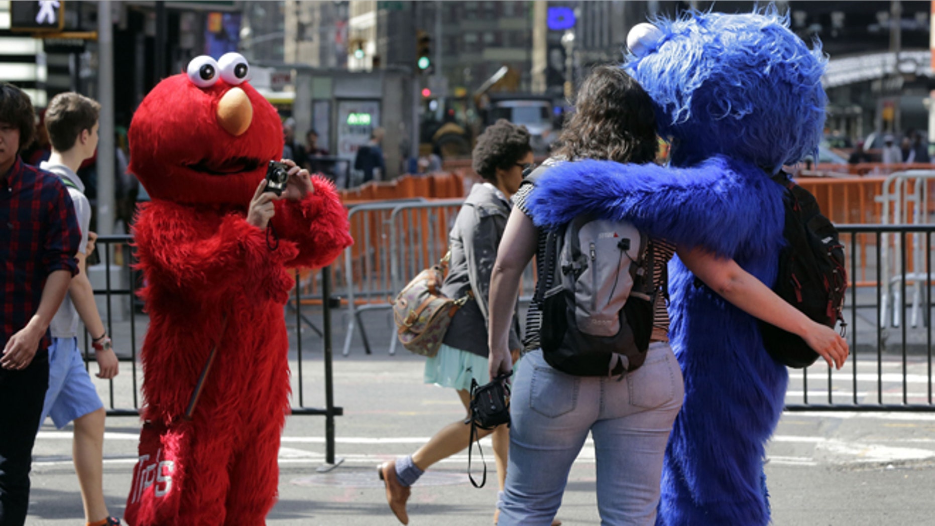 An Elmo character, in New York's Times Square, Tuesday, April 9, 2013.