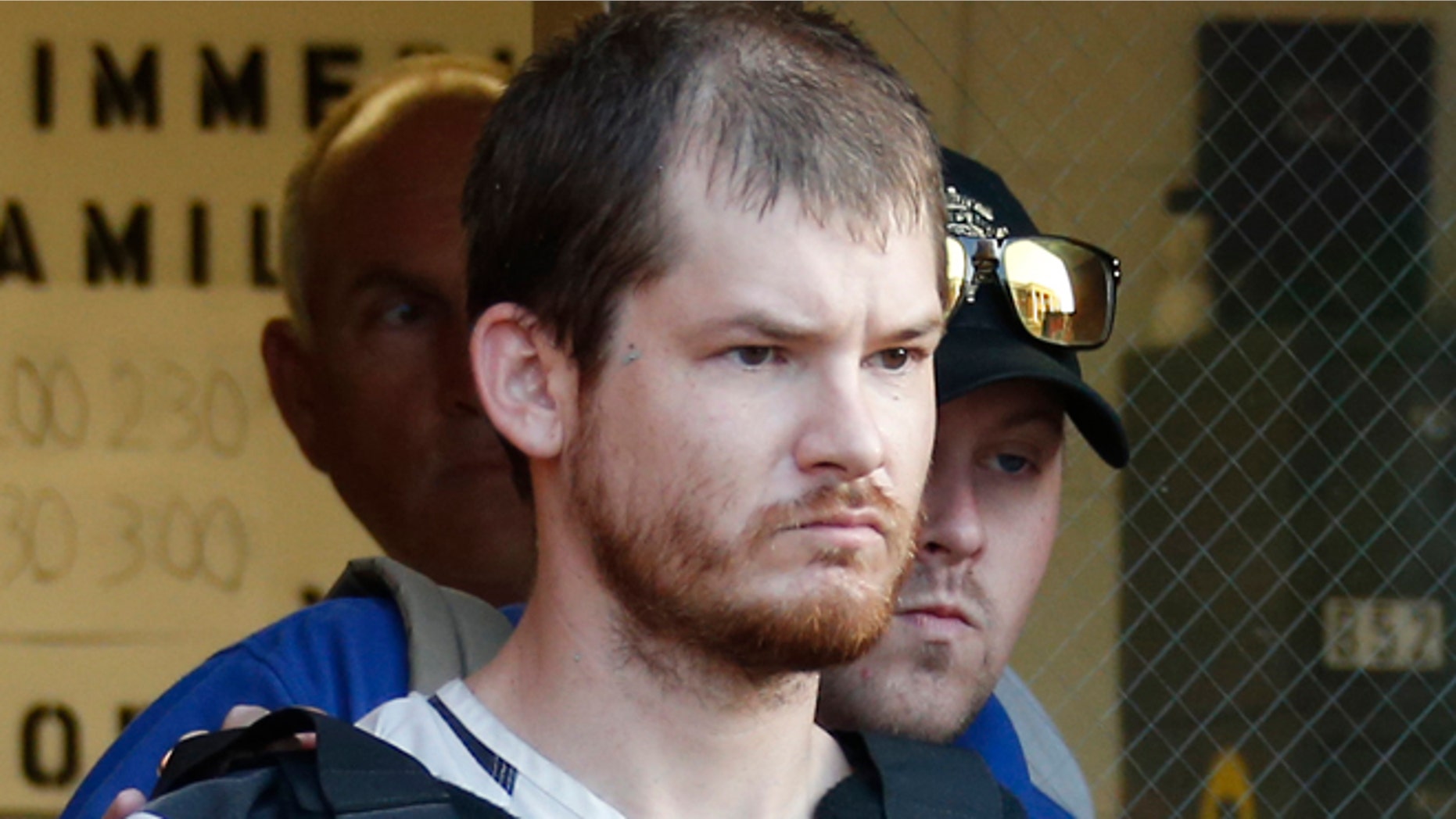 Sept. 11, 2014: Timothy Ray Jones Jr., is escorted by lawmen out of the Smith County Jail in Raleigh, Miss., to a vehicle for transport to Lexington County, S.C., where is expected to be charged with murder in the deaths of his five children after he led authorities to a secluded clearing in Alabama, Tuesday, where their bodies were found wrapped in garbage bags.