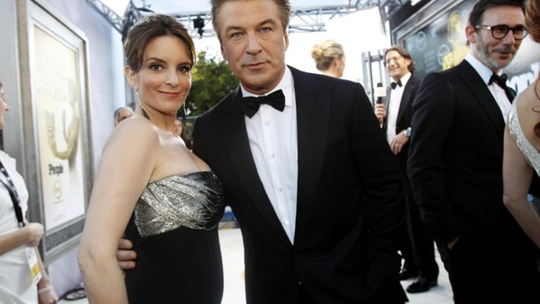 Actors Tina Fey (L) and Alec Baldwin, from the television series "30 Rock" at the Screen Actor's Guild Awards in January. The show will come to an end after its seventh season.