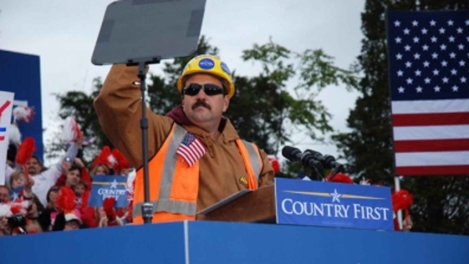 Tito "the builder" Muñoz speaks at a McCain rally.