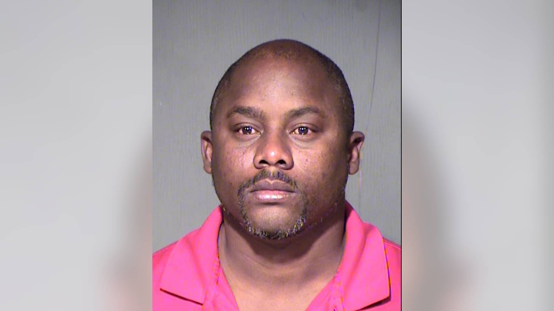 This undated booking photo provided by the Maricopa County Sheriff shows James Koryor, 41, who was arrested on manslaughter and child abuse charges after police said he left his toddler son in a hot car during a day of heavy drinking in the southwestern city of Phoenix.Koryor made an initial court appearance Tuesday, April 21, where a judge set a $50,000 bond and assigned the case to the public defender's office. Prosecutors argued for higher bail, saying Koryor has extensive ties to Liberia, Ivory Coast and Ghana and could flee. (Maricopa County Sheriff via AP)