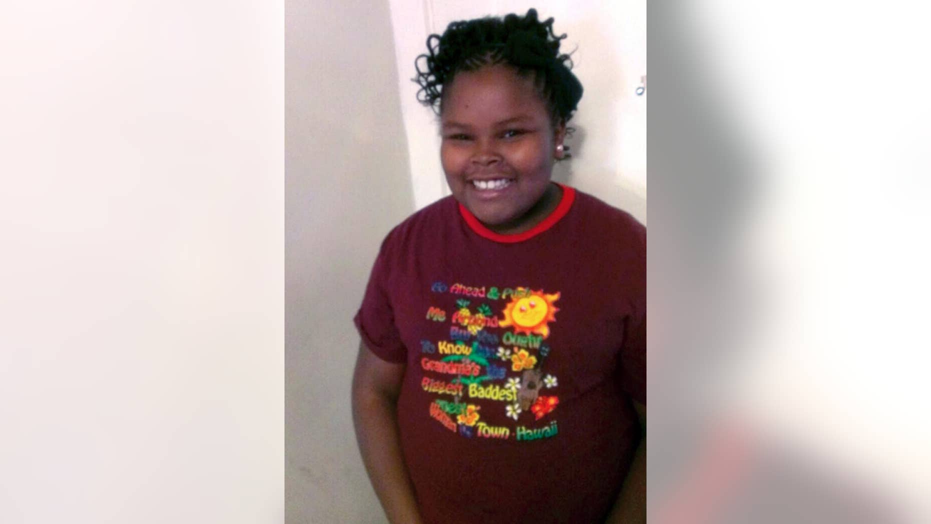File - This undated file photo provided by the McMath family and Omari Sealey shows Jahi McMath, the 13-year-old girl who was declared brain dead Dec. 12, 2013 after suffering complications from sleep apnea surgery. A year later, Jahi remains on a ventilator and hooked to feeding tubes, and her case has ignited a debate over the definition of brain death. (AP Photo/Courtesy of McMath Family and Omari Sealey, File)
