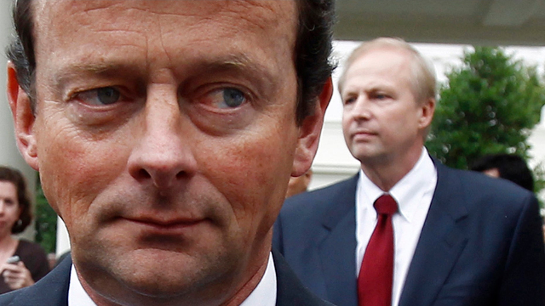 June 16, 2010: BP CEO Tony Hayward and Managing Director Bob Dudley, in background, are seen leaving the White House after meeting with President Obama.