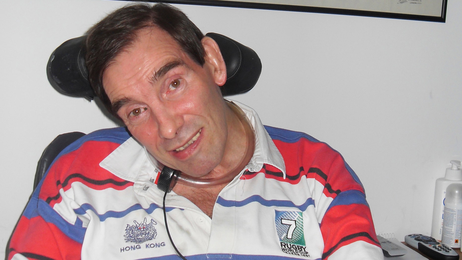 Tony Nicklinson sits at his home in Wiltshire, England, where following a stroke he suffers from locked-in syndrome. (AP Photo/Tony and Jane Nicklinson)