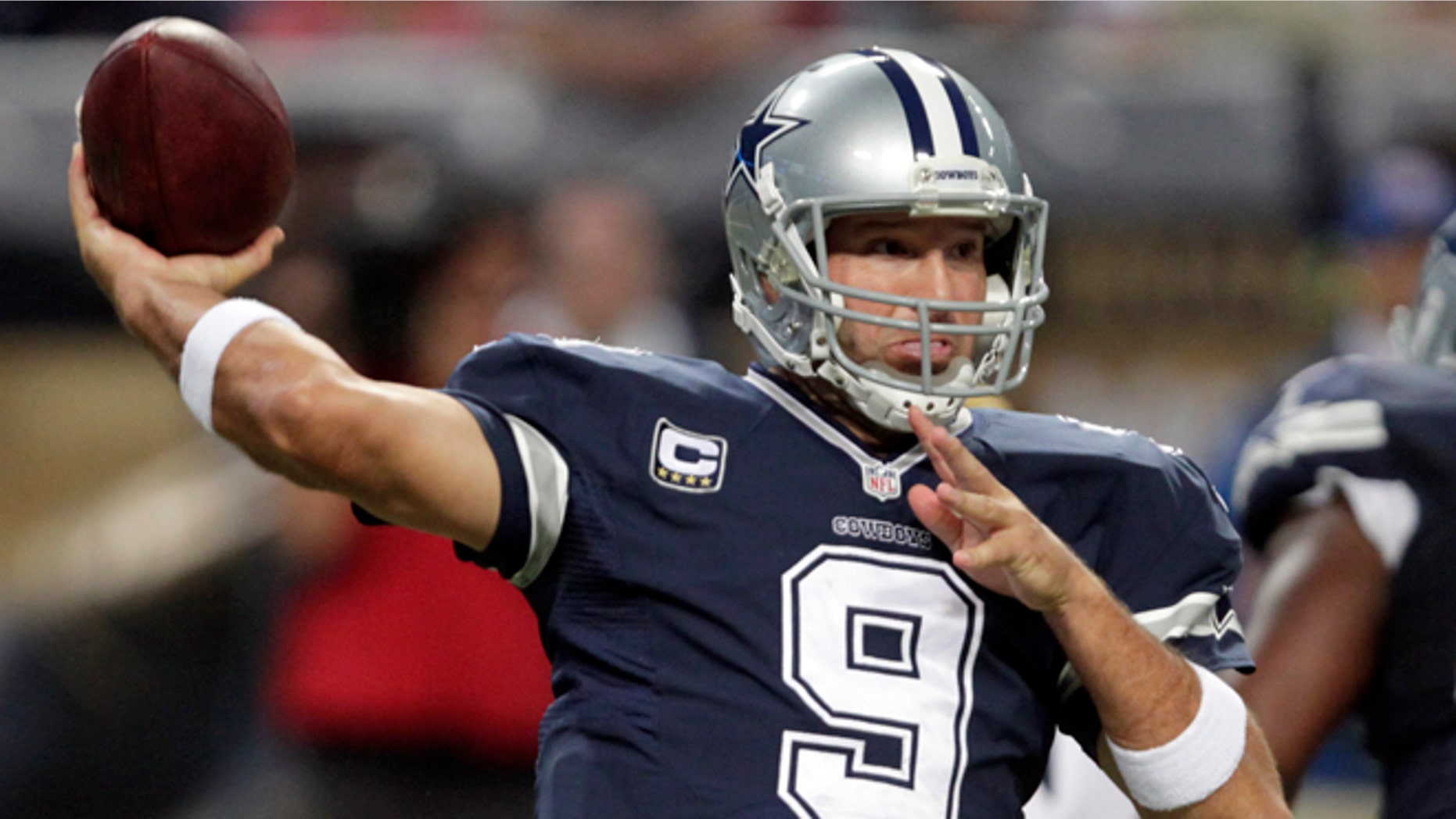 Dallas Cowboys quarterback Tony Romo throws during the second quarter of an NFL football game against the St. Louis Rams, Sunday, Sept. 21, 2014, in St. Louis. (AP Photo/Tom Gannam)