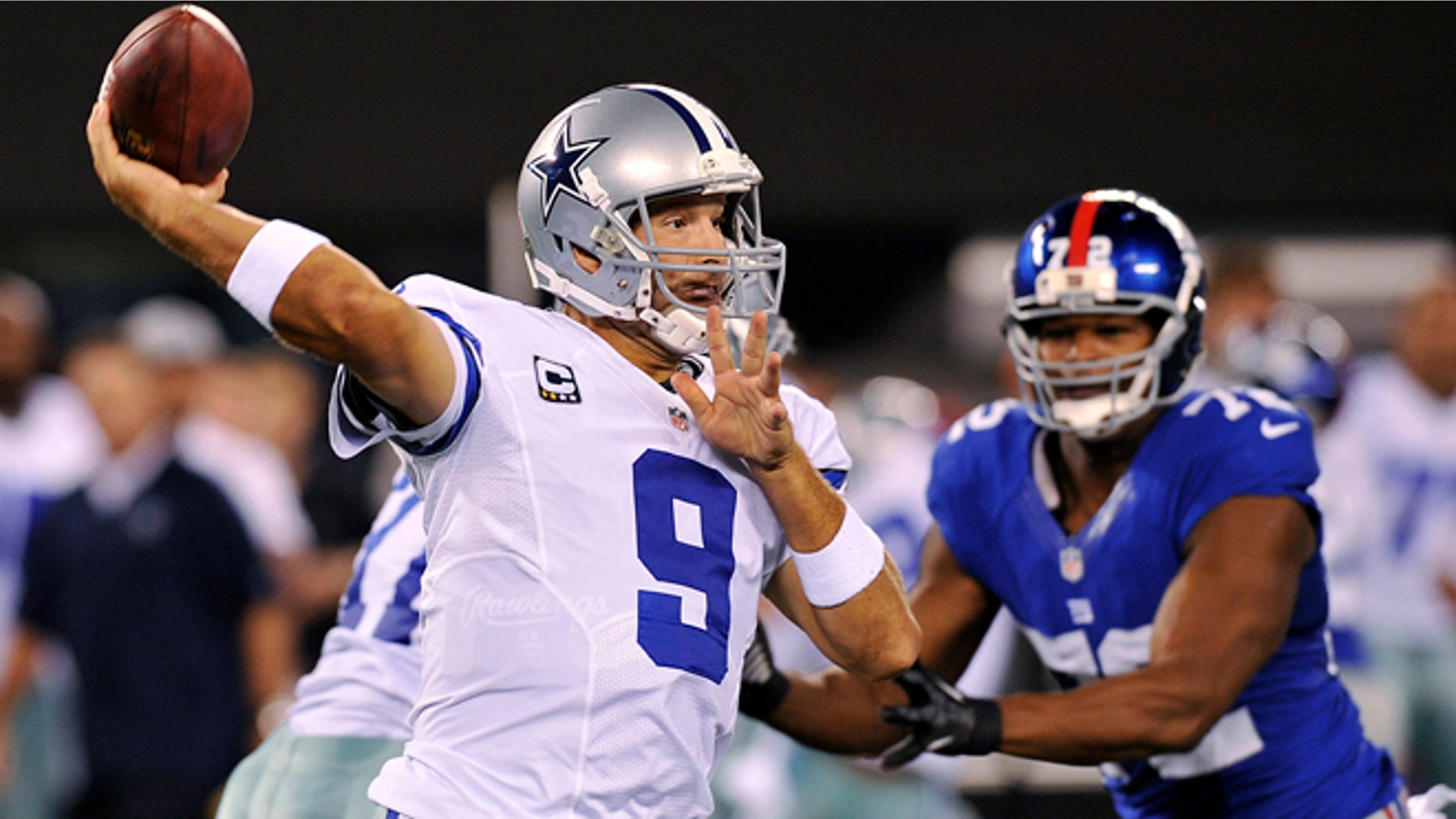 Dallas Cowboys quarterback Tony Romo (9) throws a pass during the first half of an NFL football game against the New York Giants, Wednesday, Sept. 5, 2012, in East Rutherford, N.J. (AP Photo/Bill Kostroun)