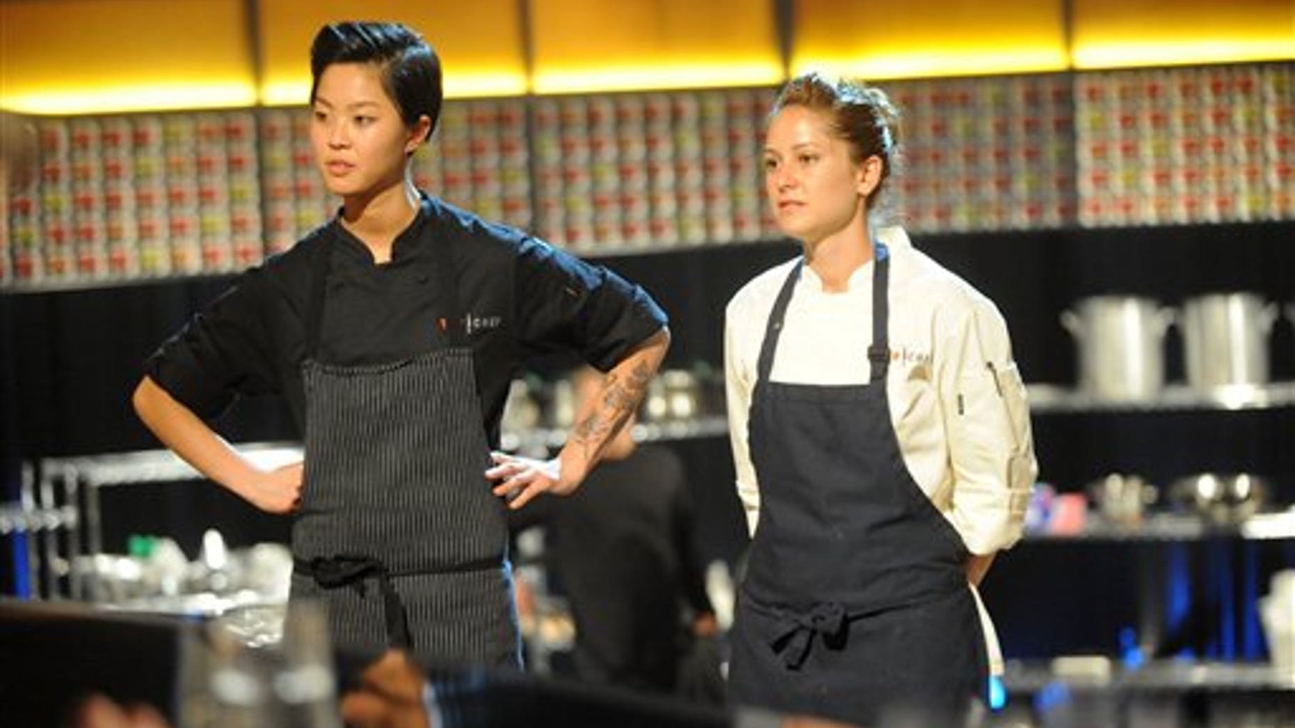 This image released by Bravo shows chef contestants Kristen Kish, left, and Brooke Williamson in a scene from "Top Chef: Seattle."