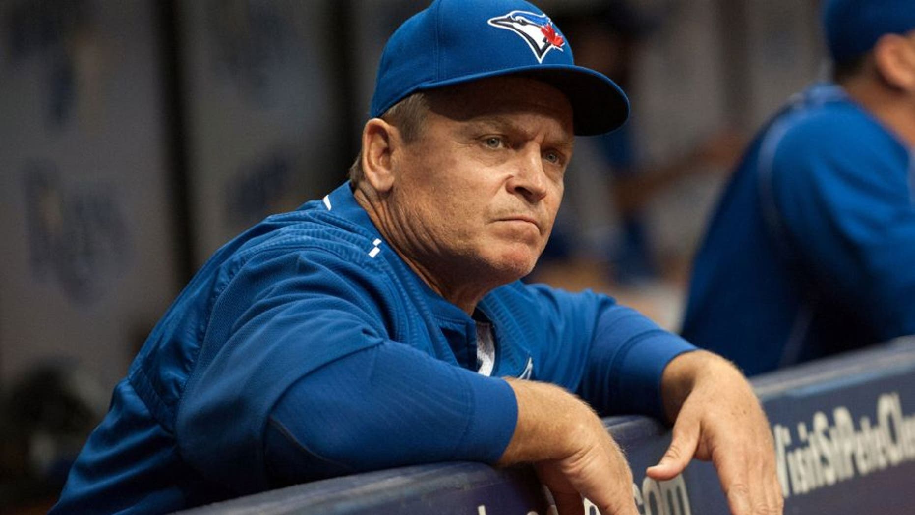 Apr 25, 2015; St. Petersburg, FL, USA; Toronto Blue Jays manager John Gibbons (5) in the dugout during the first inning against the Tampa Bay Rays at Tropicana Field. Mandatory Credit: Jeff Griffith-USA TODAY Sports