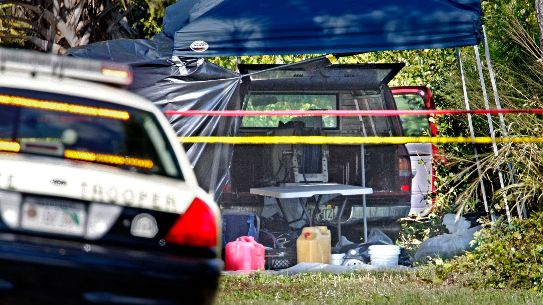 Feb. 16: Authorities investigate Jorge Barahona's pesticide truck after it was found Feb. 14 along the side of Interstate 95 near West Palm Beach, Fla. The badly deteriorated body of Barahona's 10-year-old daughter was discovered in the truck hours after her critically injured twin brother was found having seizures in the front seat, doused in acid by his father, according to officials.