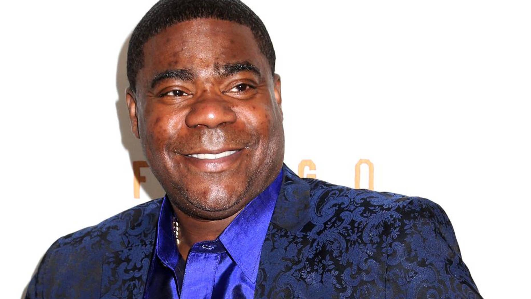 FILE - In this April 9, 2014 file photo, actor Tracy Morgan attends the FX Networks Upfront premiere screening of "Fargo" at the SVA Theater in New York. Morgan’s lawsuit against Wal-Mart over a fatal auto accident in New Jersey last summer is headed to court. Attorneys are due to meet in federal court in Trenton, NJ., Tuesday, Nov. 18, 2014, for a scheduling conference. A Wal-Mart truck slammed into the back of a limo van that was carrying Morgan and several friends on the New Jersey Turnpike back from a show in Delaware. James McNair, a friend of Morgan’s, was killed. Morgan suffered a broken leg and broken ribs and three others were injured. (Photo by Greg Allen/Invision/AP, File)
