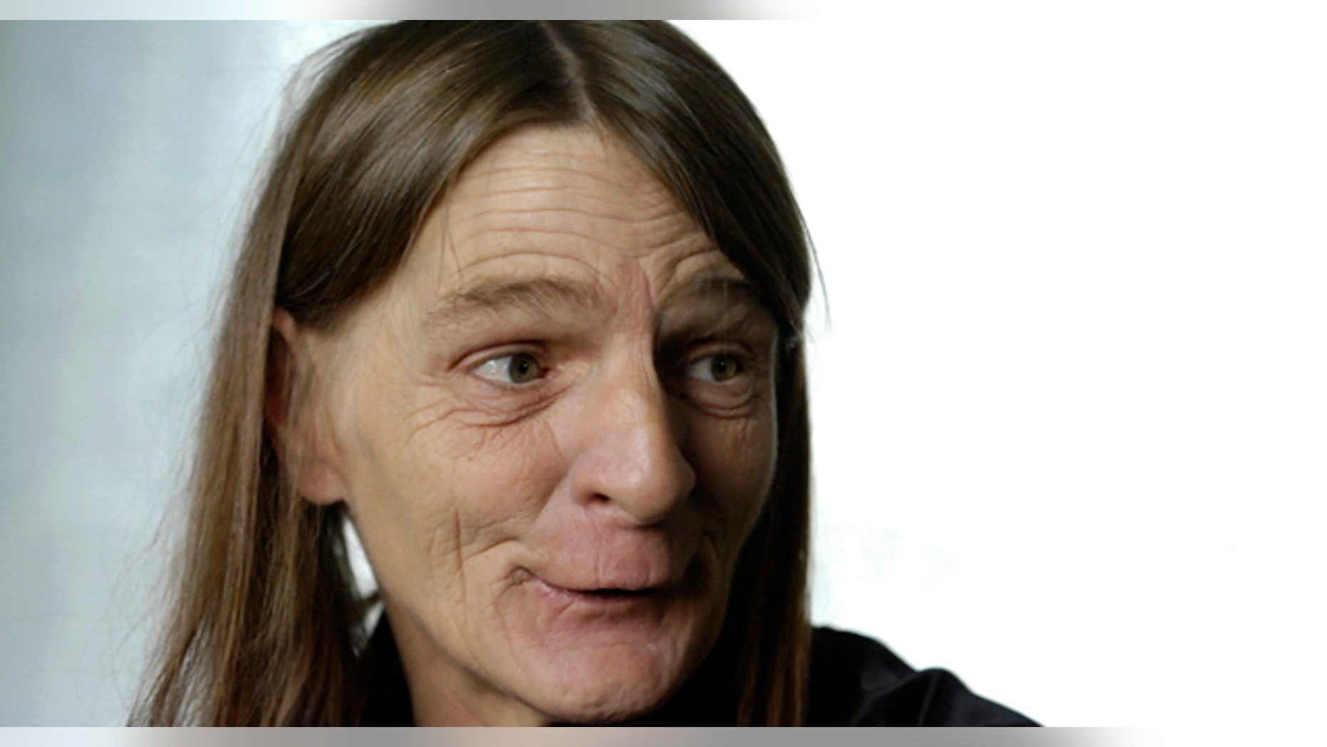 In this December 9, 2008 photo, Catherine Carlson, 52, discusses her recent encounters with local law enforcement during an interview in her home in Payette, Idaho. (AP)