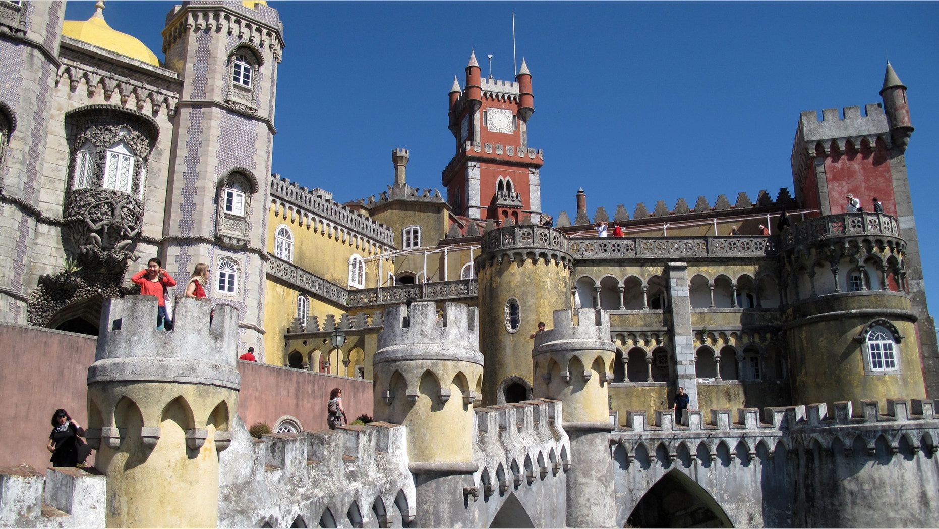 The exterior of Pena Palace in Sintra, Portugal. It's like a castle seen through a kaleidoscope, one of a number of spectacular buildings found in Sintra.