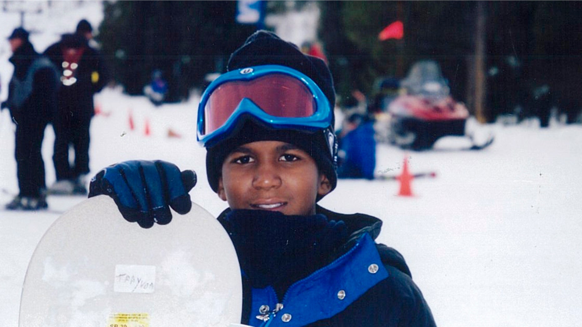 FILE - This undated file photo provided by the Martin family, shows Trayvon Martin snowboarding. Martin was slain in the town of Sanford, Fla., on Feb. 26 in a shooting that has set off a nationwide furor over race and justice. (AP Photo/Martin Family, File)