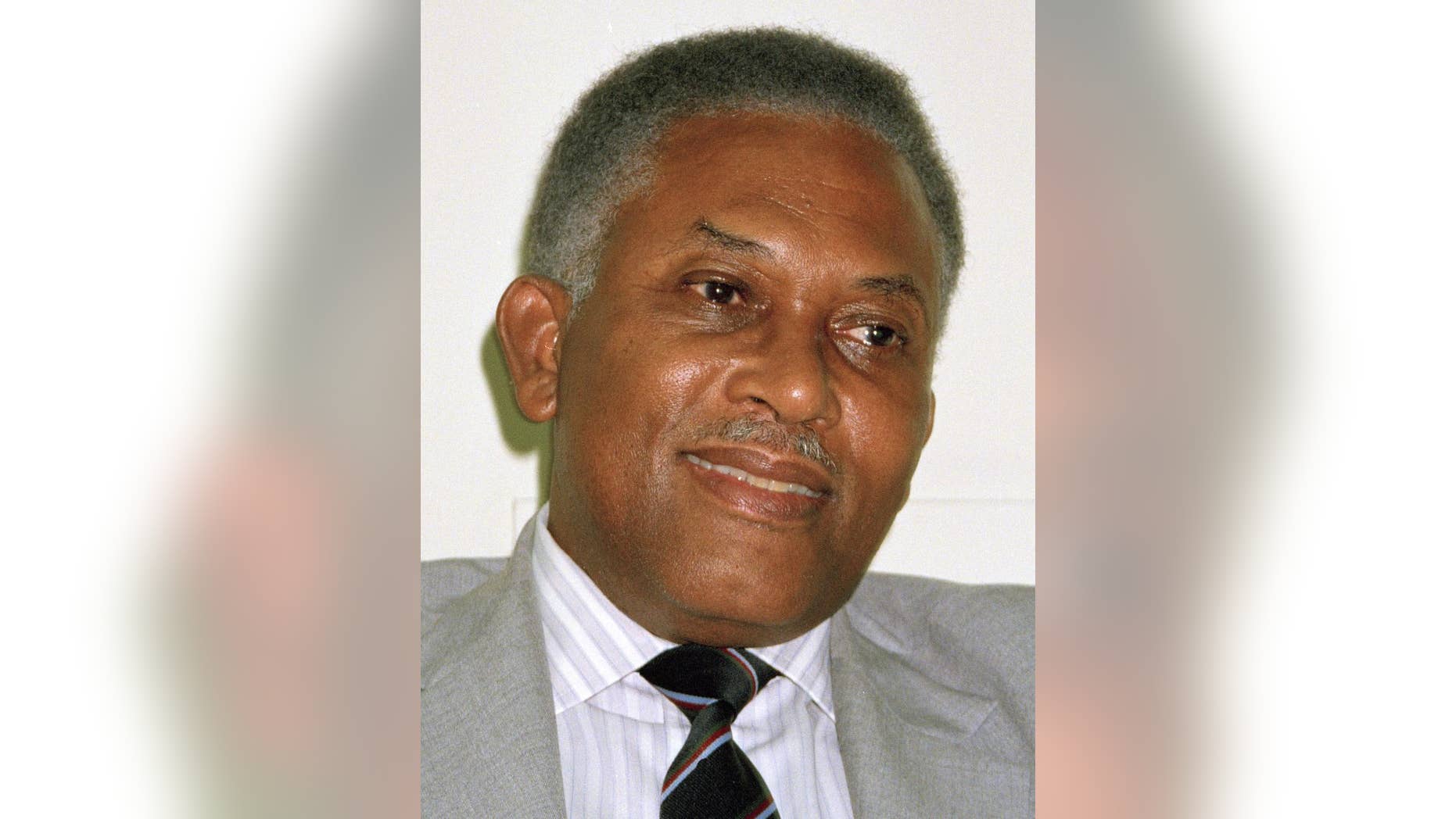 FILE - This June 1991 file photo shows Trinidad and Tobago Prime Minister Arthur Raymond Robinson. The former Trinidad leader shot during a bloody 1990 coup attempt, has died. He was 87. National Security Minister Gary Griffith said Robinson died Wednesday after being hospitalized for diabetes complications. (AP Photo/Robert Glass, File)