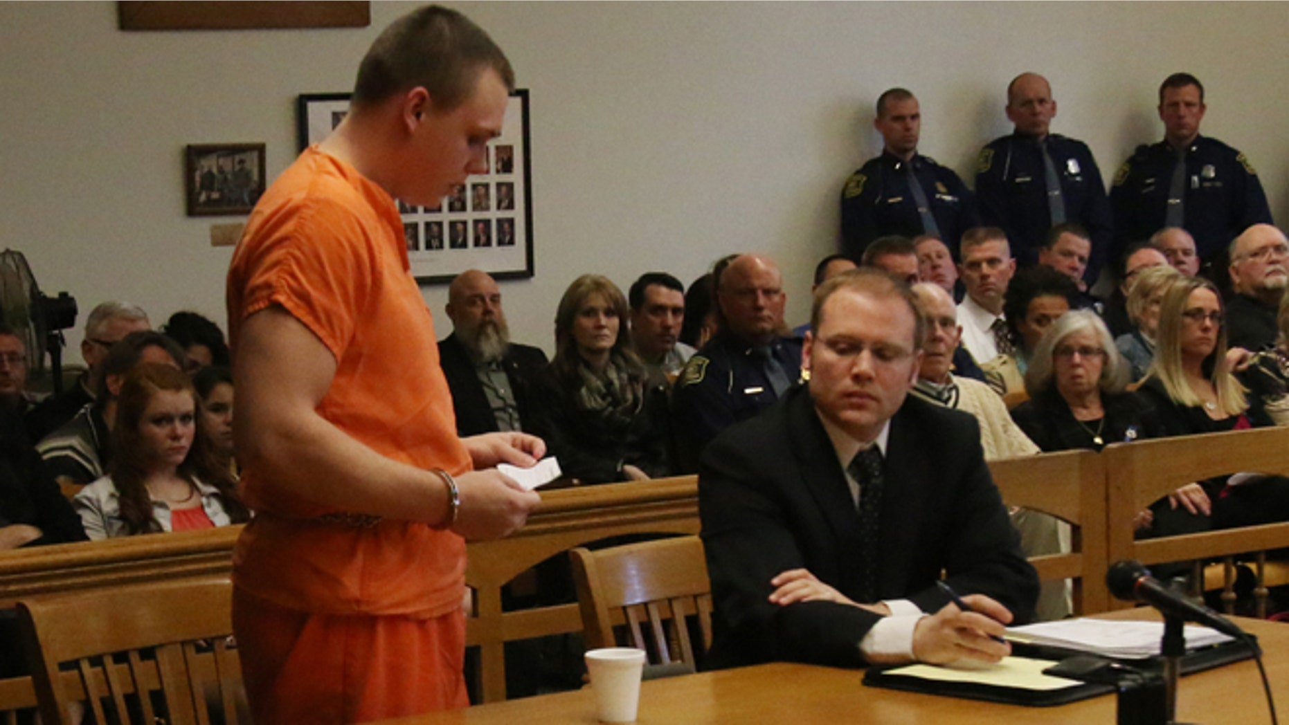 April 8: Eric Knysz reads a statement during his sentencing. Knysz was removed from life-support about 10:30 a.m. Thursday at a hospital in Jackson