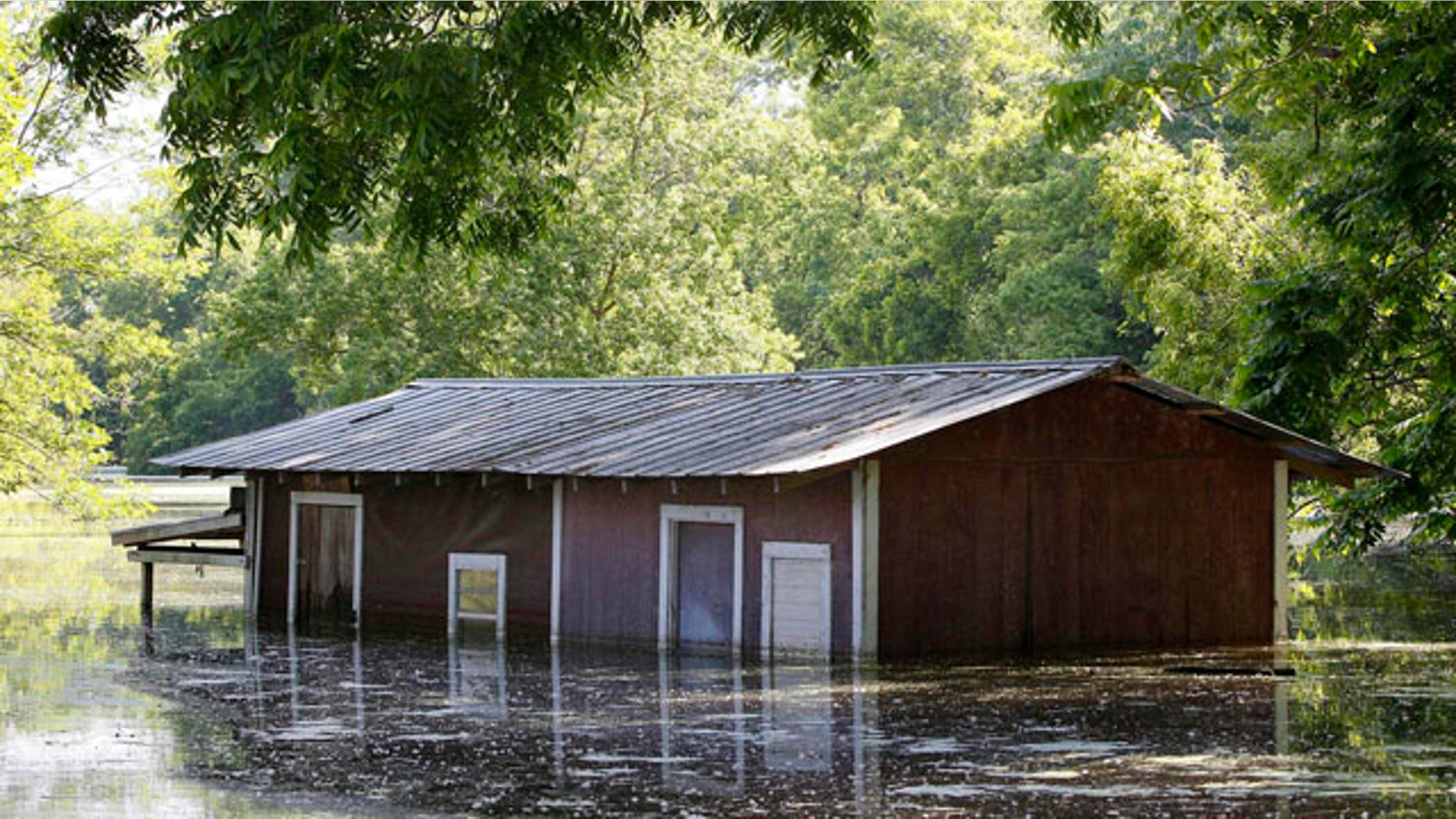 May 18, 2011: A partially-flooded building on the banks of the Atchafalaya River outside of the levee protection area in Simmesport, La.