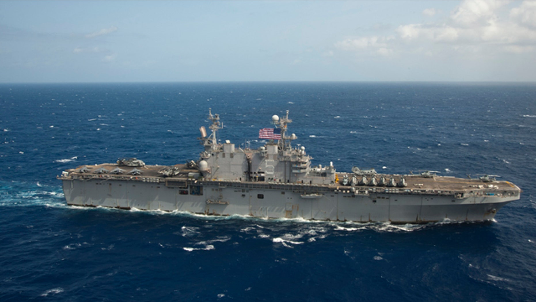 FILE: This photo shows the USS Peleliu, which the Navy diverted to assist in the search for a missing 35-year-old British man.