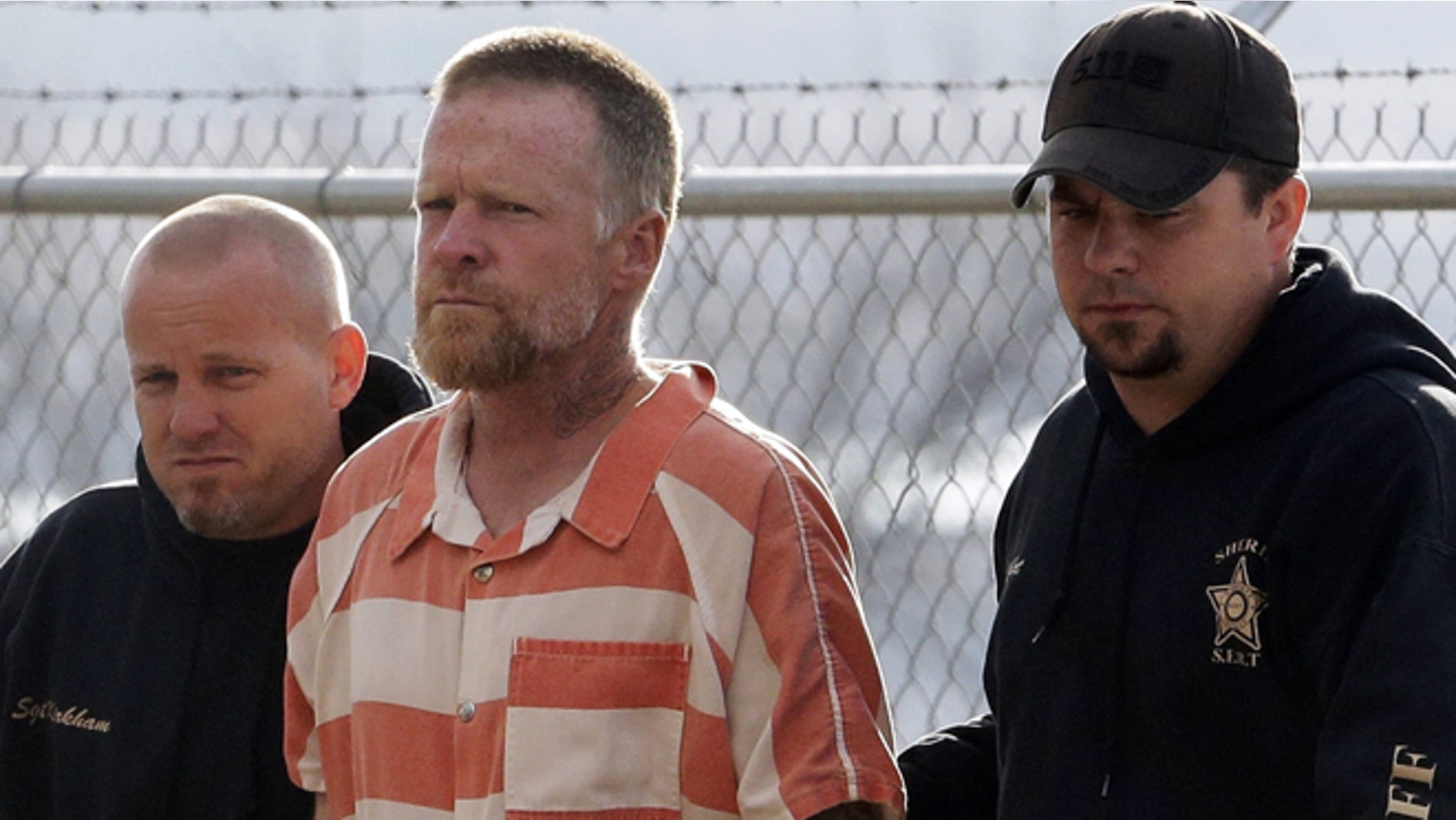 April 2, 2013: In this file photo, Troy James Knapp, 45, is escorted by Sanpete Sheriff's deputies to the Sanpete County Jail in Manti, Utah.