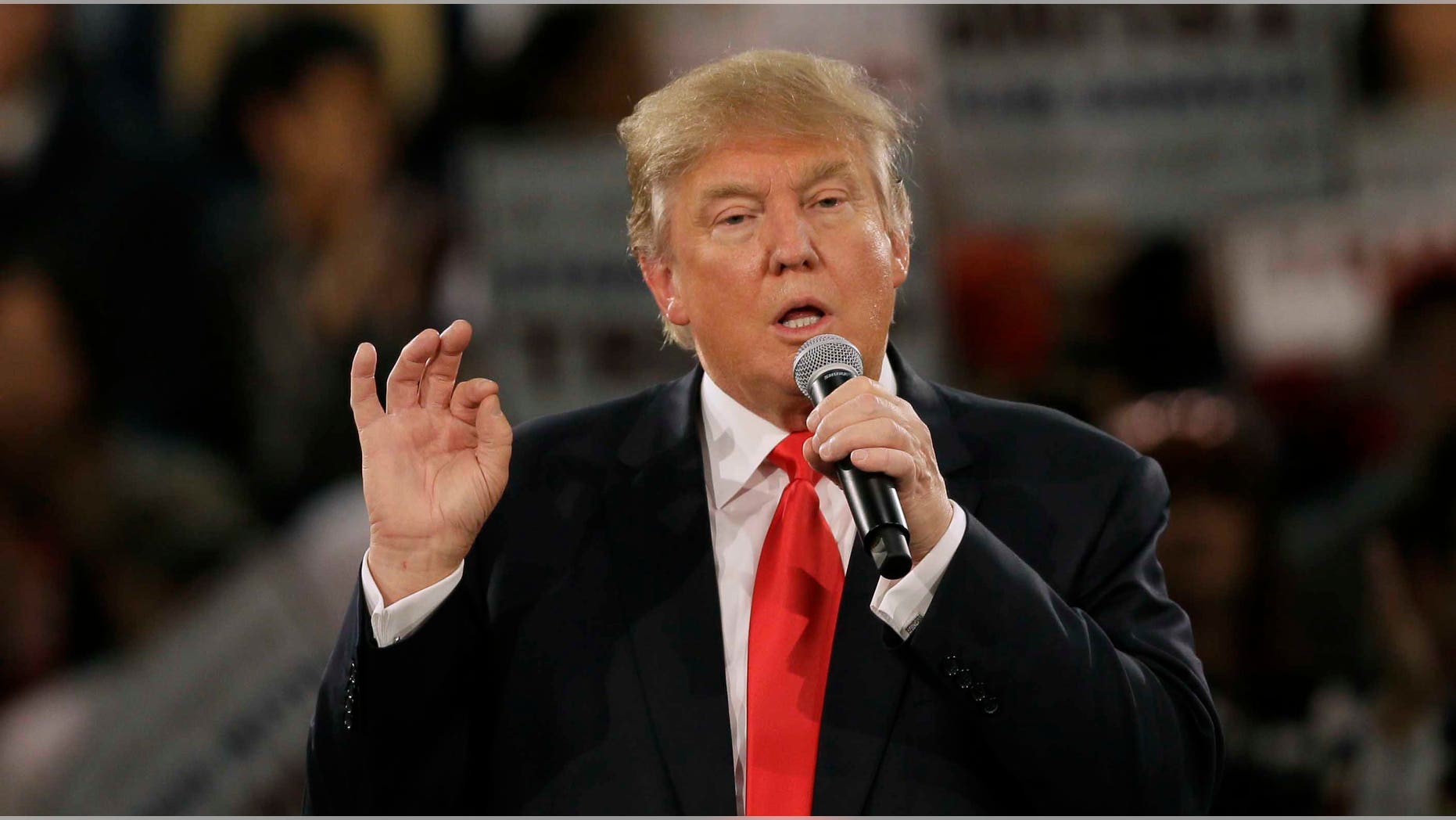 In this Dec. 11, 2015, photo, Republican presidential candidate Donald Trump speaks during a campaign rally in Des Moines, Iowa. Thereâs no legal or historical precedent for closing U.S. borders to the worldâs 1.6 billion Muslims, but neither is there any Supreme Court case that clearly prevents a president or Congress from doing so. Legal experts are divided over how the high court would react to Trumpâs call for a temporary halt to Muslims entering the United States. (AP Photo/Charlie Neibergall)