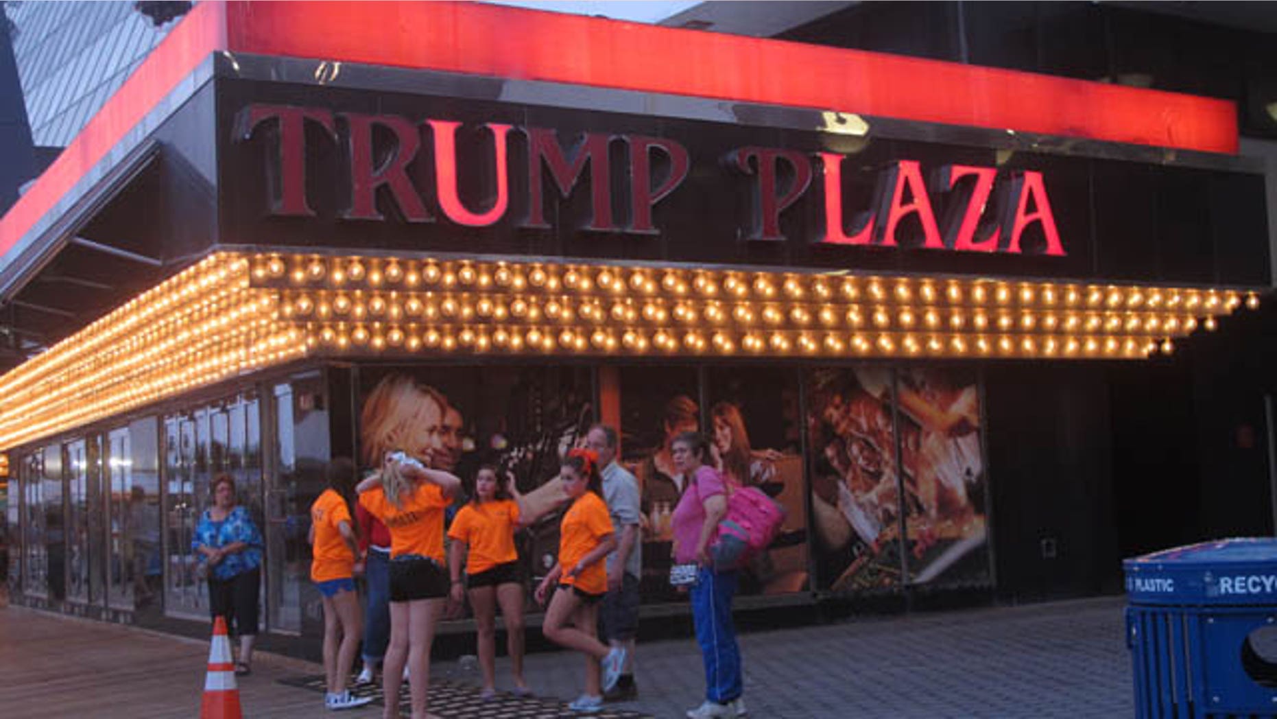 FILE - In this July 24, 2014 file photo, several lights are burned out in the illuminated facade of Trump Plaza Hotel Casino in Atlantic City N.J. (AP Photo/Wayne Parry, FILE)