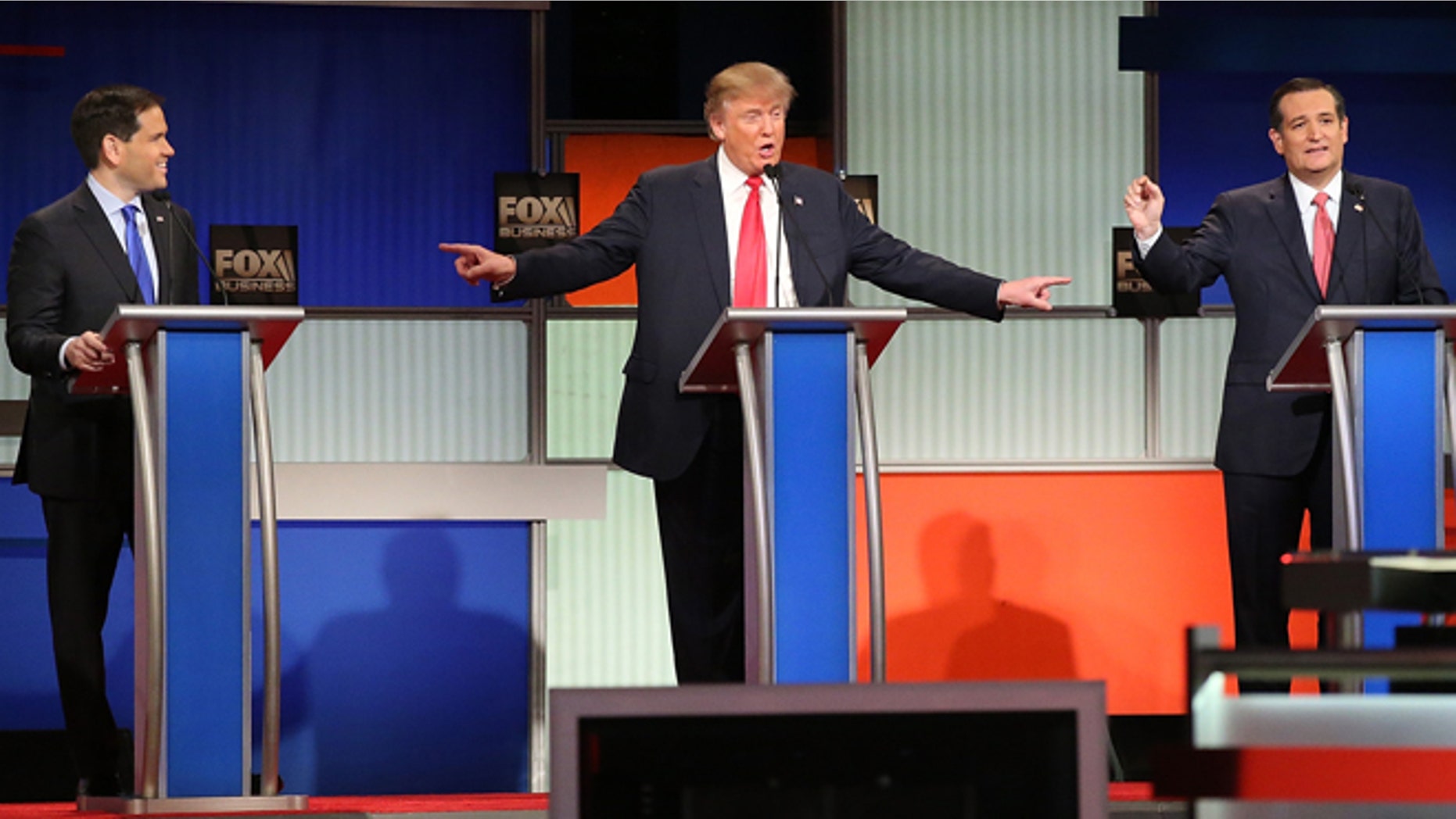 NORTH CHARLESTON, SC - JANUARY 14: Republican presidential candidates (L-R) Sen. Marco Rubio (R-FL), Donald Trump and Sen. Ted Cruz (R-TX) participate in the Fox Business Network Republican presidential debate at the North Charleston Coliseum and Performing Arts Center on January 14, 2016 in North Charleston, South Carolina. The sixth Republican debate is held in two parts, one main debate for the top seven candidates, and another for three other candidates lower in the current polls. (Photo by Scott Olson/Getty Images)
