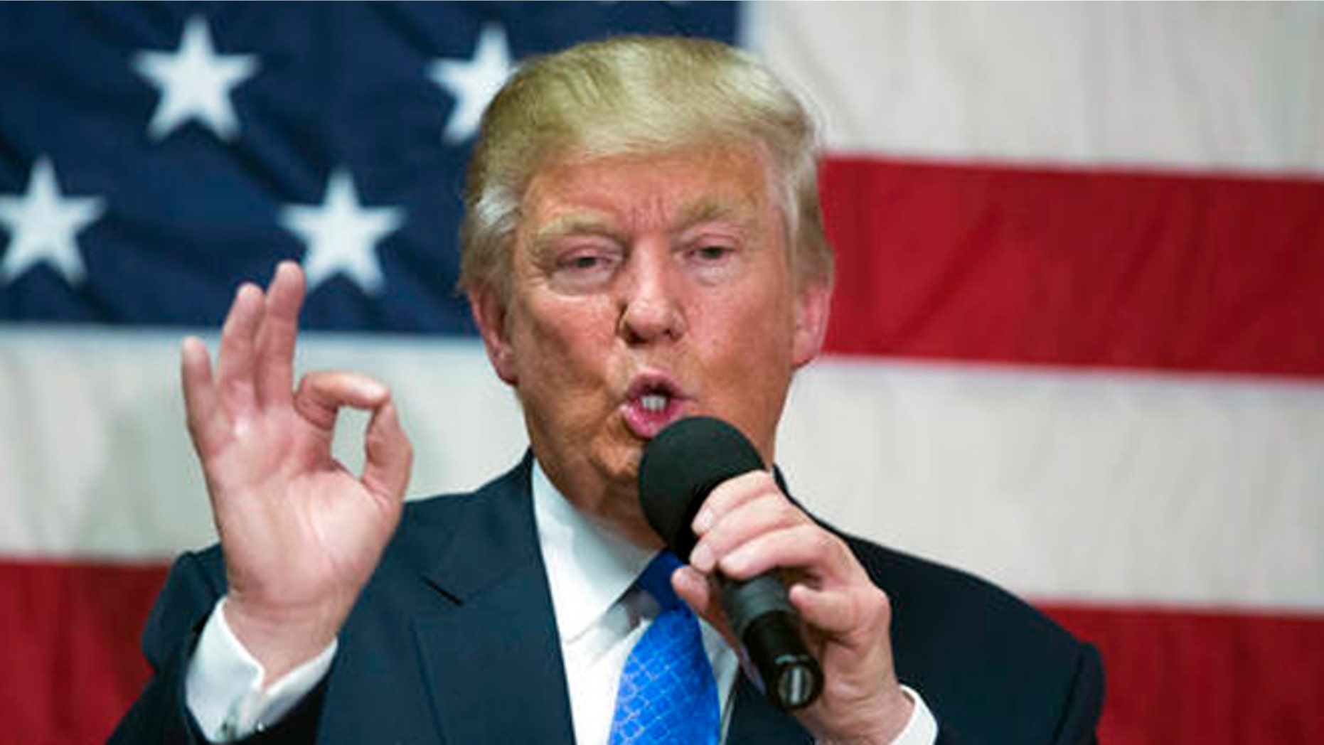 In this Oct. 6, 2016, photo, Republican presidential candidate Donald Trump speaks during a town hall in Sandown, N.H. Trump made a series of lewd and sexually charged comments about women as he waited to make a cameo appearance on a soap opera in 2005. The Republican presidential nominee issued a rare apology Friday, if anyone was offended. (AP Photo/ Evan Vucci)