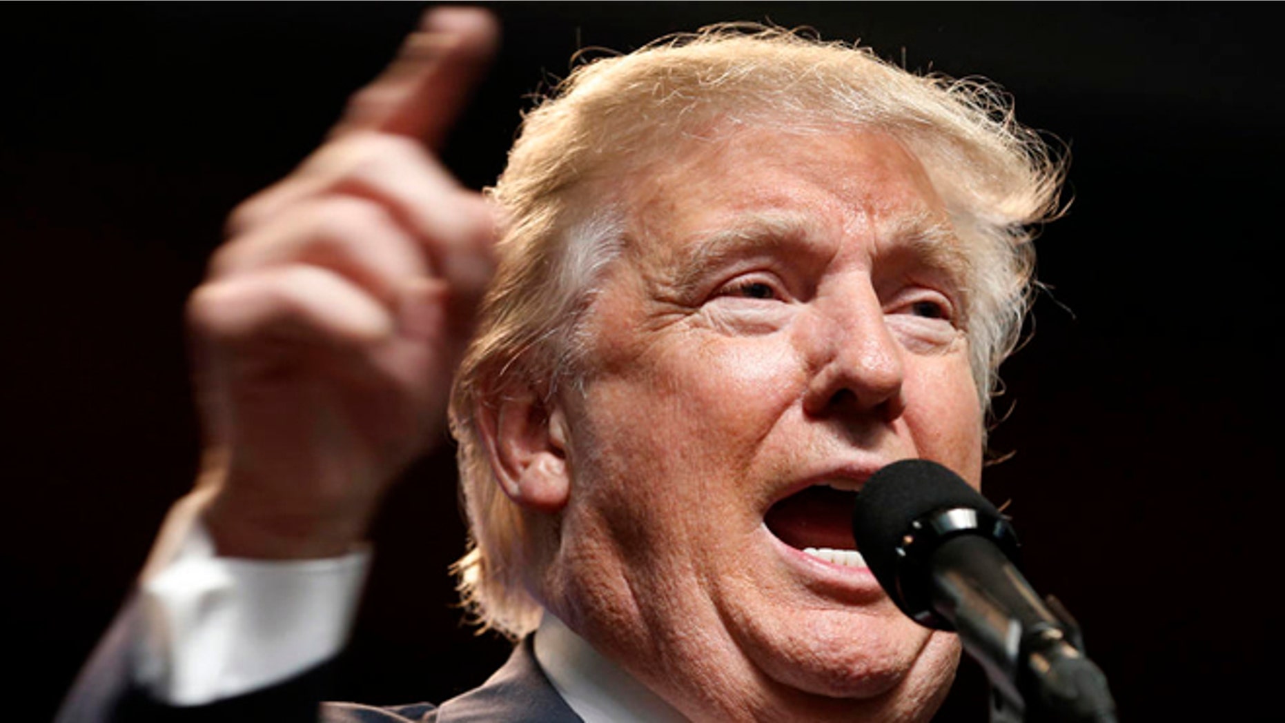 In this photo taken May 5, 2016, Republican presidential candidate Donald Trump speaks in Charleston, W. Va. There's no cheering at the White House for Donald Trump, but his ascent as the presumptive Republican nominee means a few of President Barack Obama's key achievements could be more likely to survive after he leaves office. (AP Photo/Steve Helber)