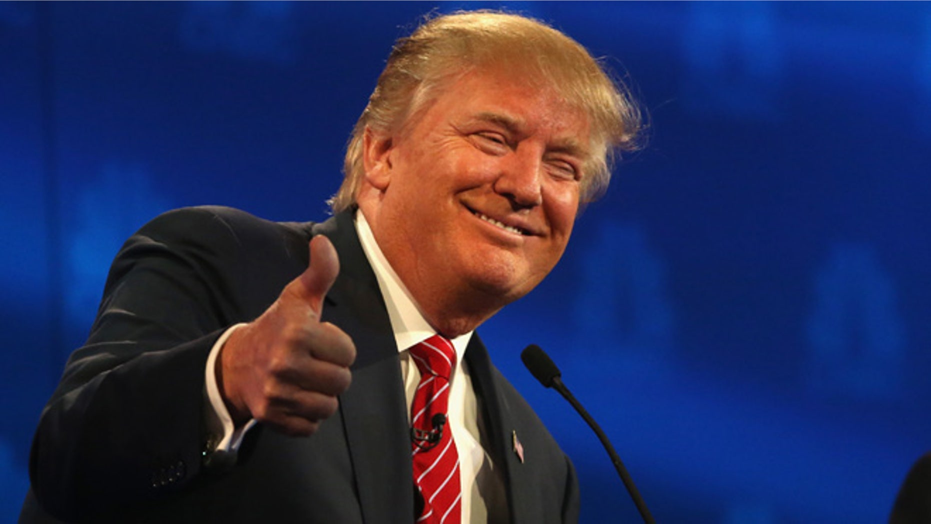 BOULDER, CO - OCTOBER 28: Presidential candidate Donald Trump gives a thumbs up during the CNBC Republican Presidential Debate at University of Colorados Coors Events Center October 28, 2015 in Boulder, Colorado. Fourteen Republican presidential candidates are participating in the third set of Republican presidential debates. (Photo by Justin Sullivan/Getty Images)