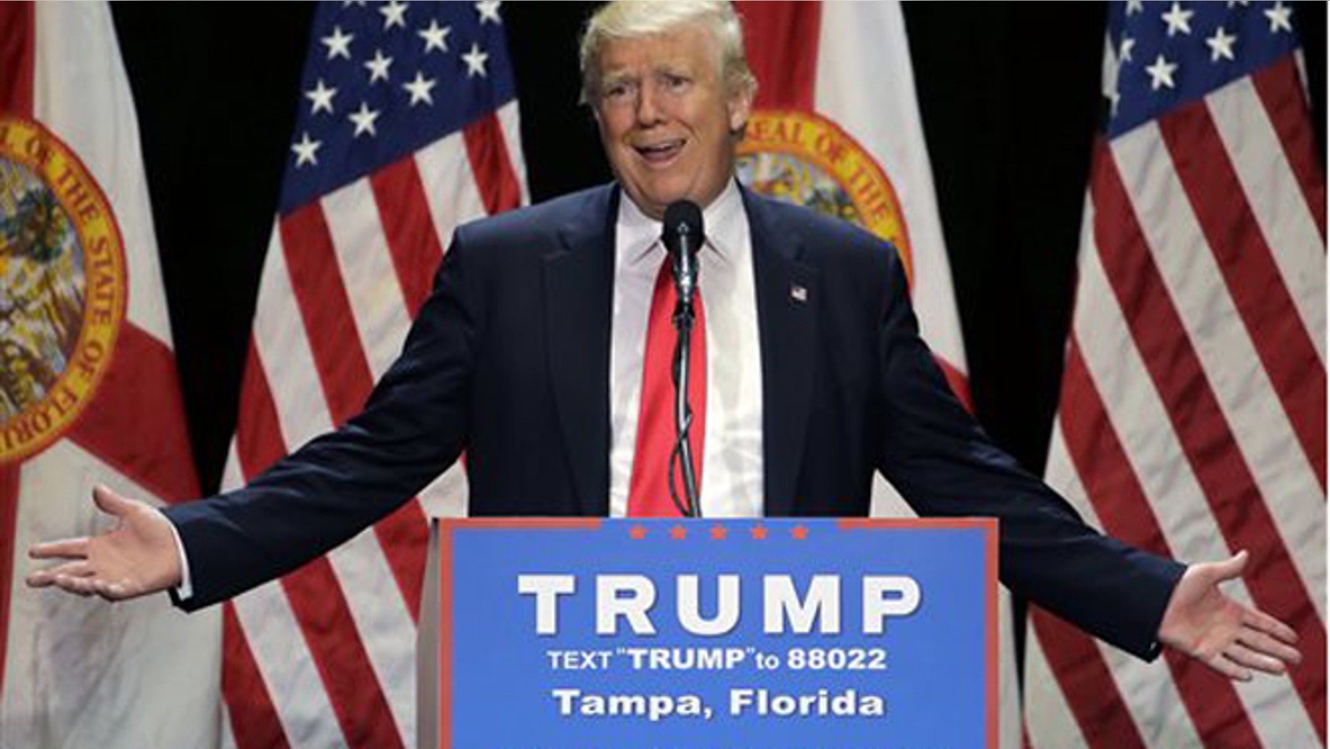 File- This June 11, 2016 file photo shows Republican presidential candidate Donald Trump gesturing during a campaign speech in Tampa, Fla. Trump plans Monday to further address the deadliest shooting in modern U.S. history in a campaign speech originally intended to attack the presumptive Democratic nominee, Hillary Clinton. The switch comes a day after Trump called for Clinton to drop out of the race for president if she didnt use the words radical Islam to describe the Florida nightclub massacre. (AP Photo/Chris O'Meara, File)