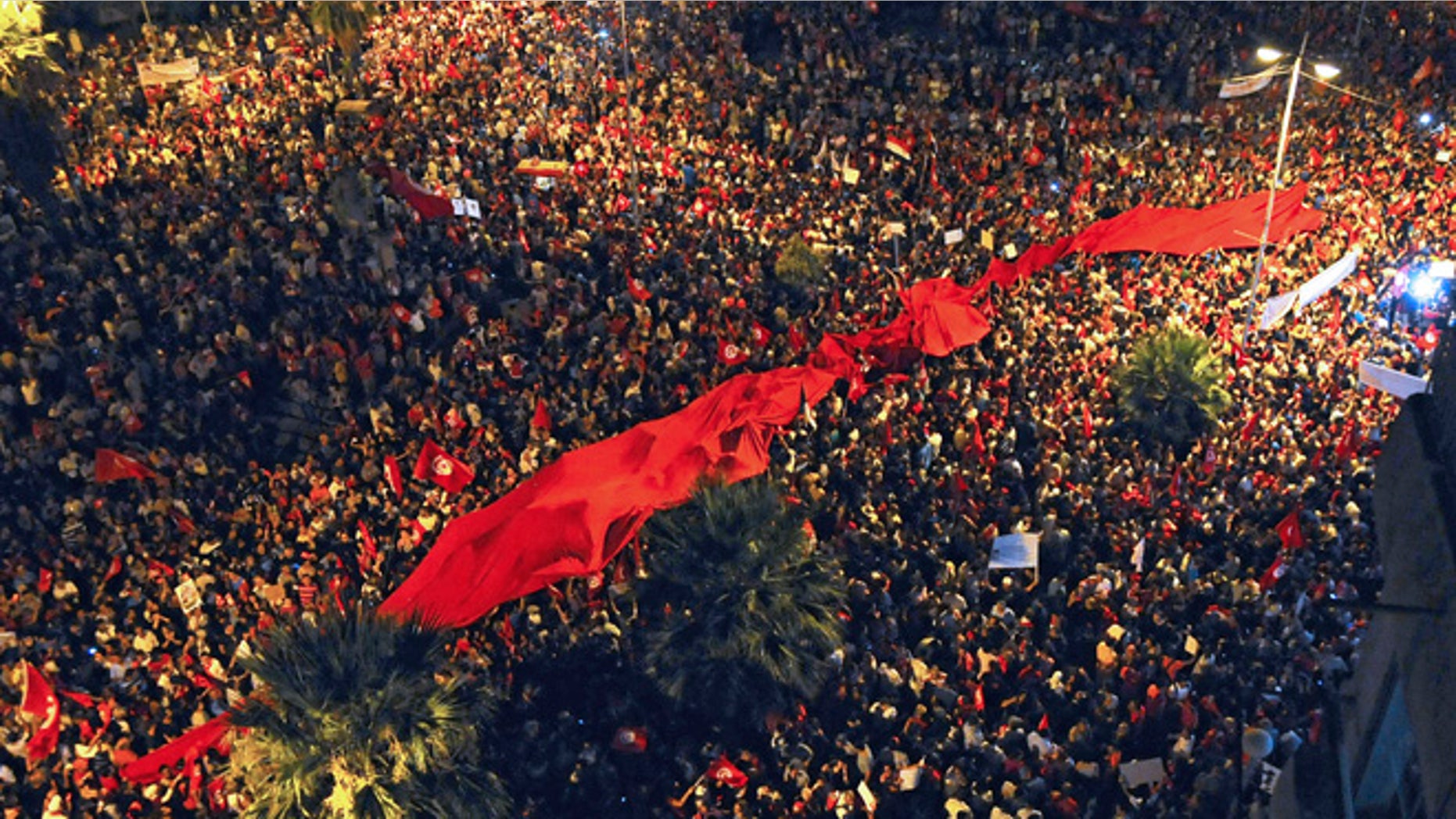 Aug. 6, 2013: People demonstrate against Tunisia's Islamist-led government in Tunis.