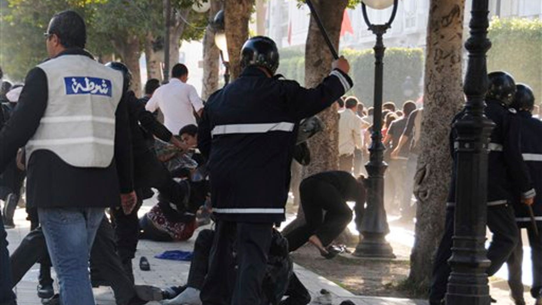 May 5: Tunisian police officers disperse hundreds of demonstrators during clashes in Tunis. The protesters complained Tunisia's new caretaker government has not followed through with the people's revolutionary aspirations. (AP)
