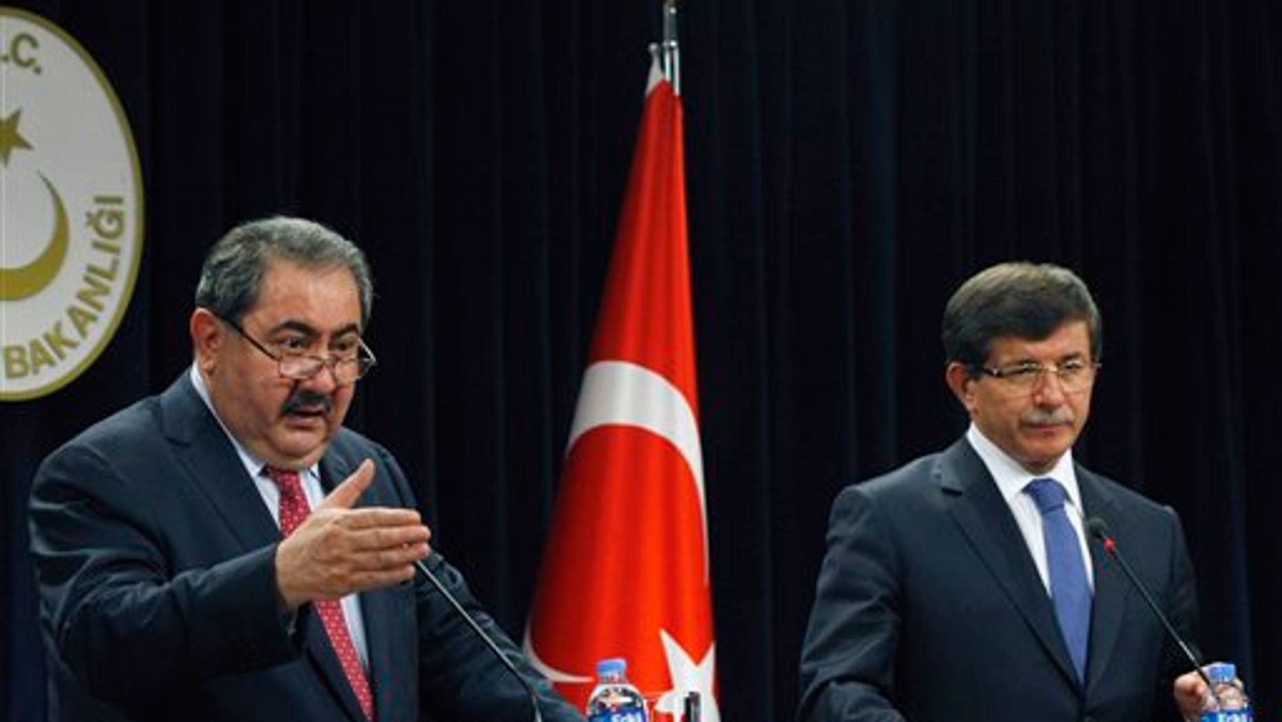 October 13: Iraqi Foreign Minister Hoshyar Zebari, left, and his Turkish counterpart Ahmet Davutoglu speak to the media after their talks in Ankara, Turkey.