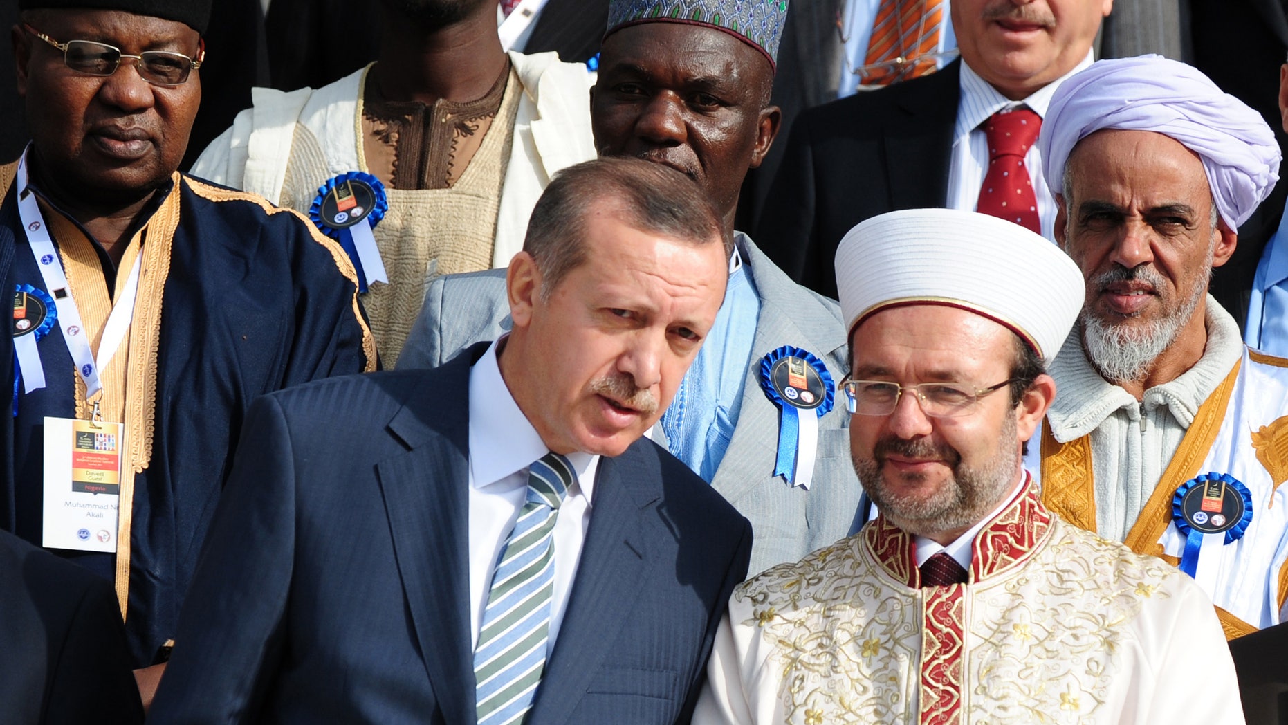 November 21: Turkish Prime Minister Recep Tayyip Erdogan, front left, speaks with Mehmet Gormez, head of Turkey's Religious Affairs Directorate, after a meeting with African Muslim religious leaders in Istanbul, Turkey.