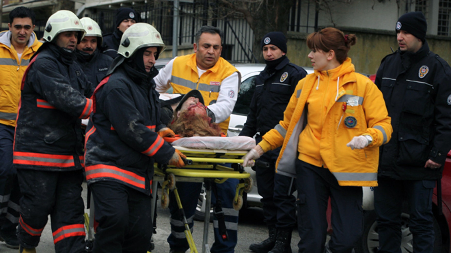 Feb. 1: Medics carry an injured woman on a stretcher to an ambulance after a suspected suicide bomber detonated an explosive device at the entrance of the U.S. Embassy in the Turkish capital, Ankara.