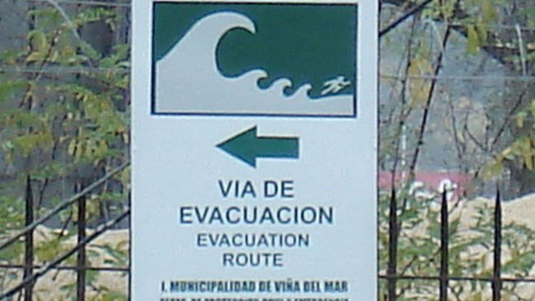 An evacuation sign in Chile. #paulogustavo tweets that Chile is prepared for catastrophe after multiple earthquake struck Viña del Mar in 1983.