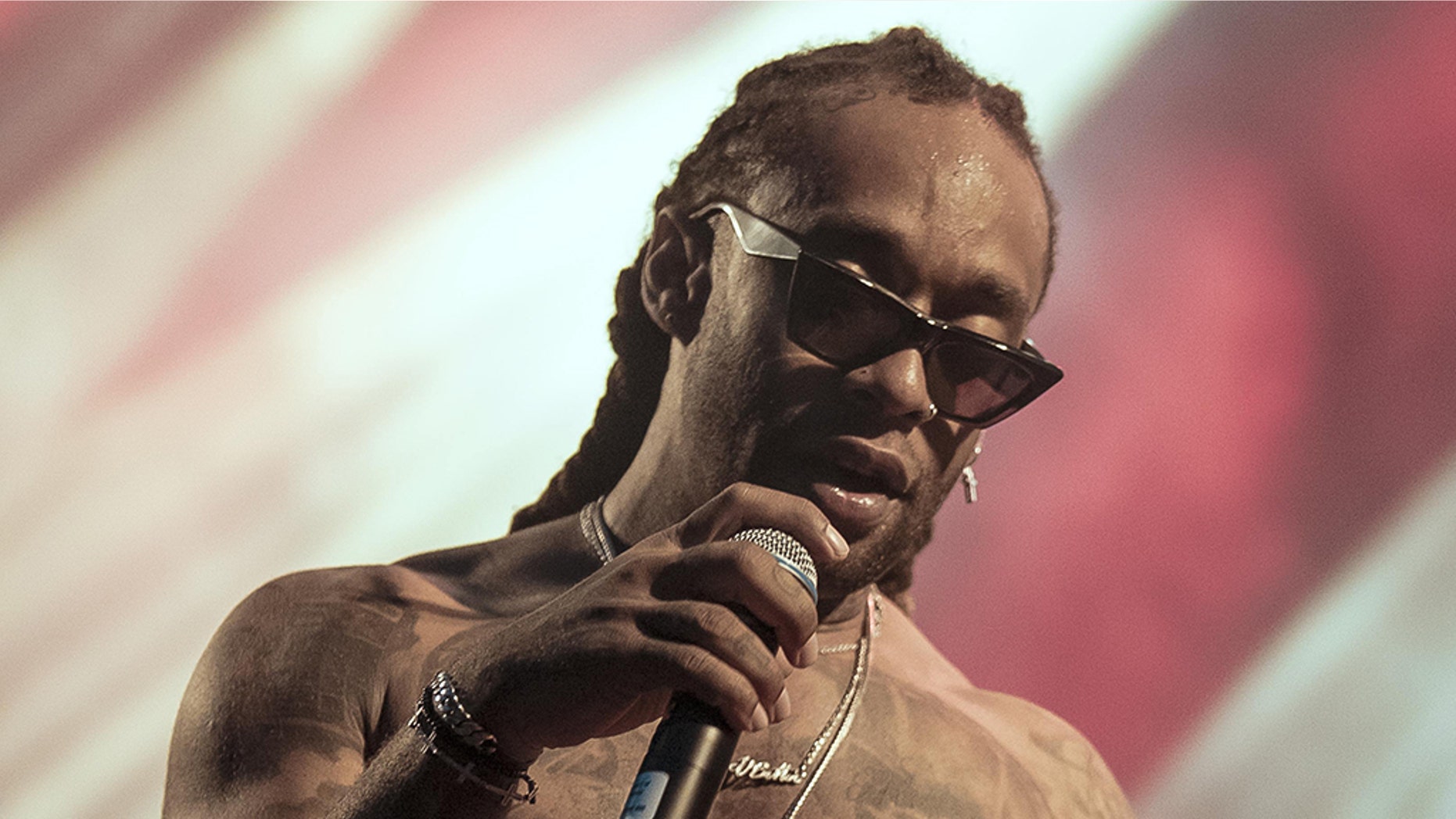 The rapper allegedly tried to have a blind woman and her dog moved from their seat.